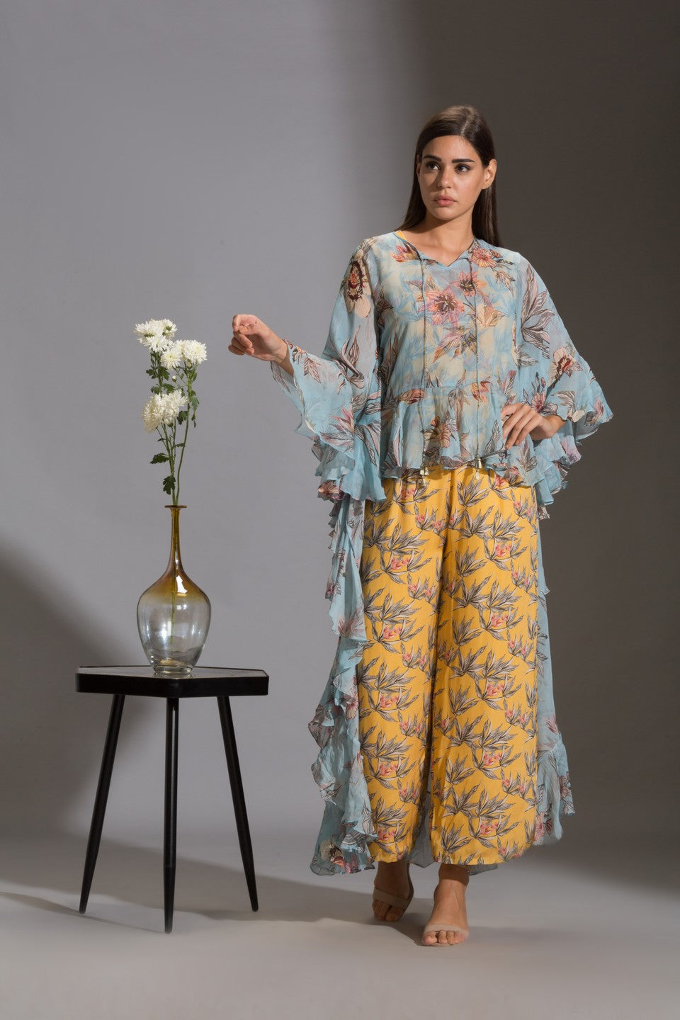 Printed jumpsuit paired with top