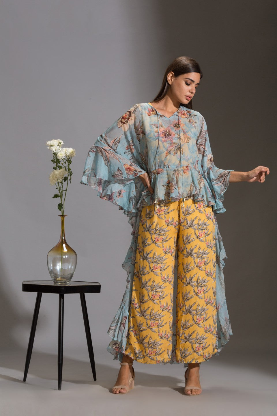Printed jumpsuit paired with top