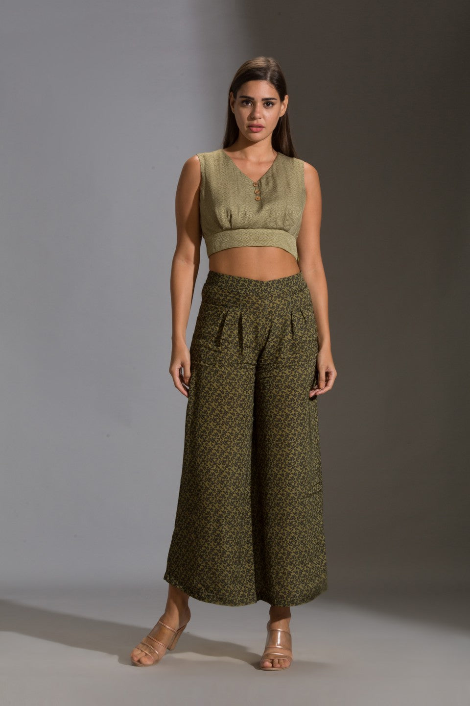Top paired with pants and rushed jacket