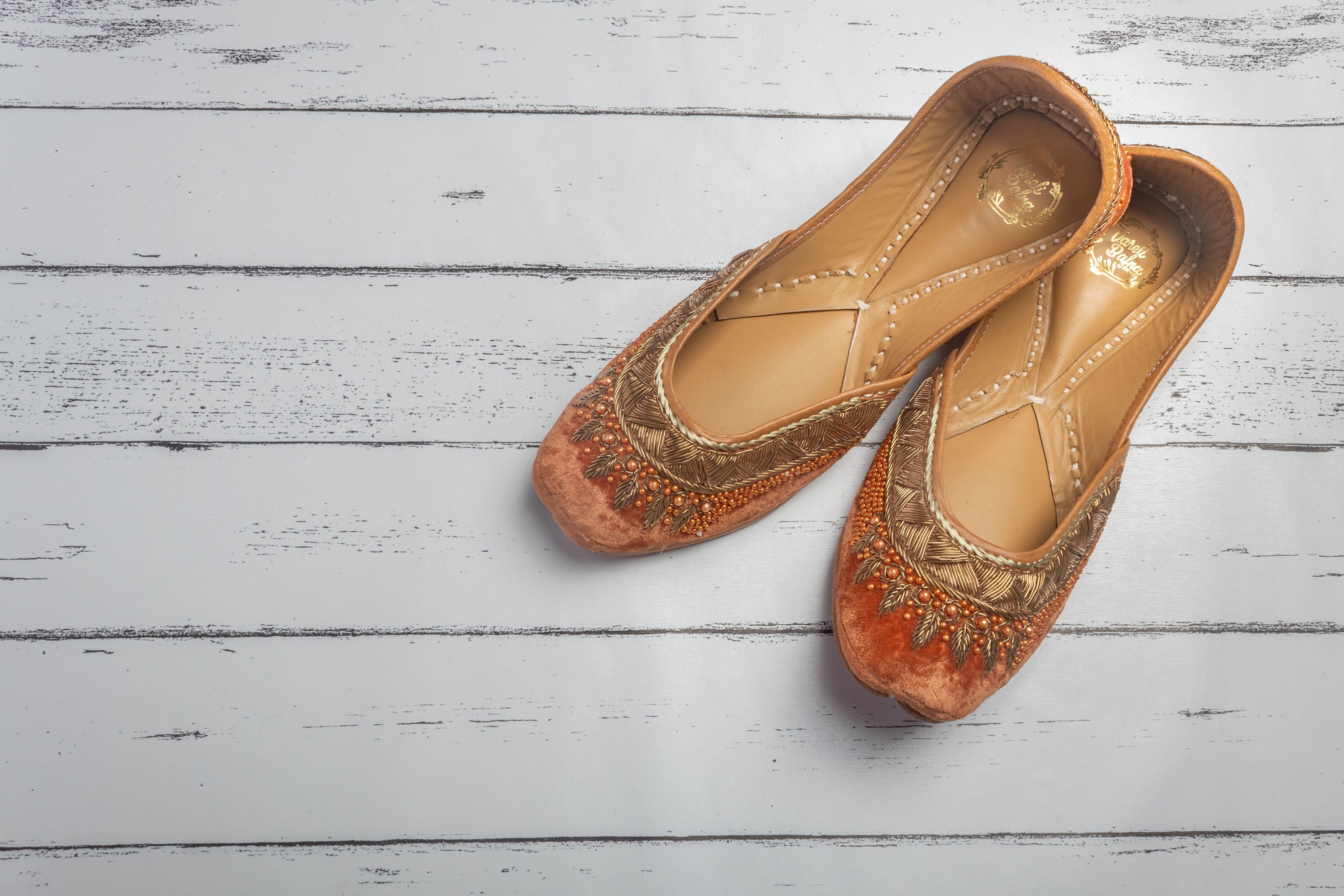 Rust Orange Hand embroidered Juttis
