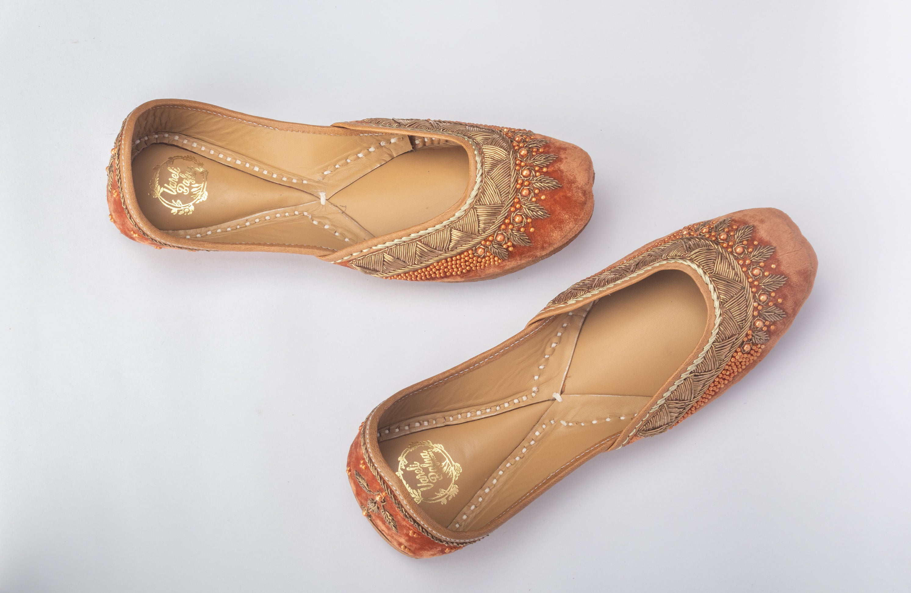 Rust Orange Hand embroidered Juttis