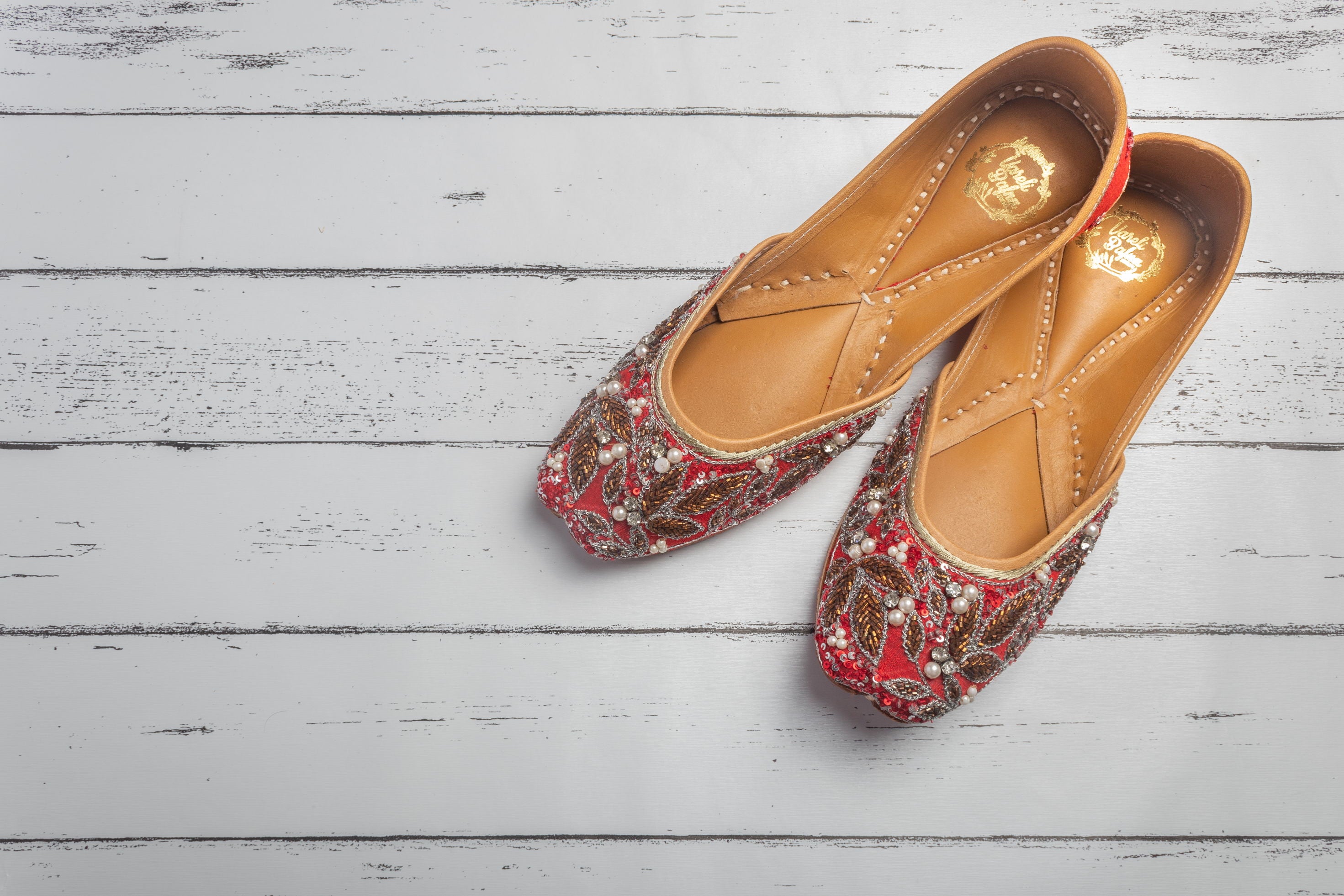 Red Hand embroidered Juttis
