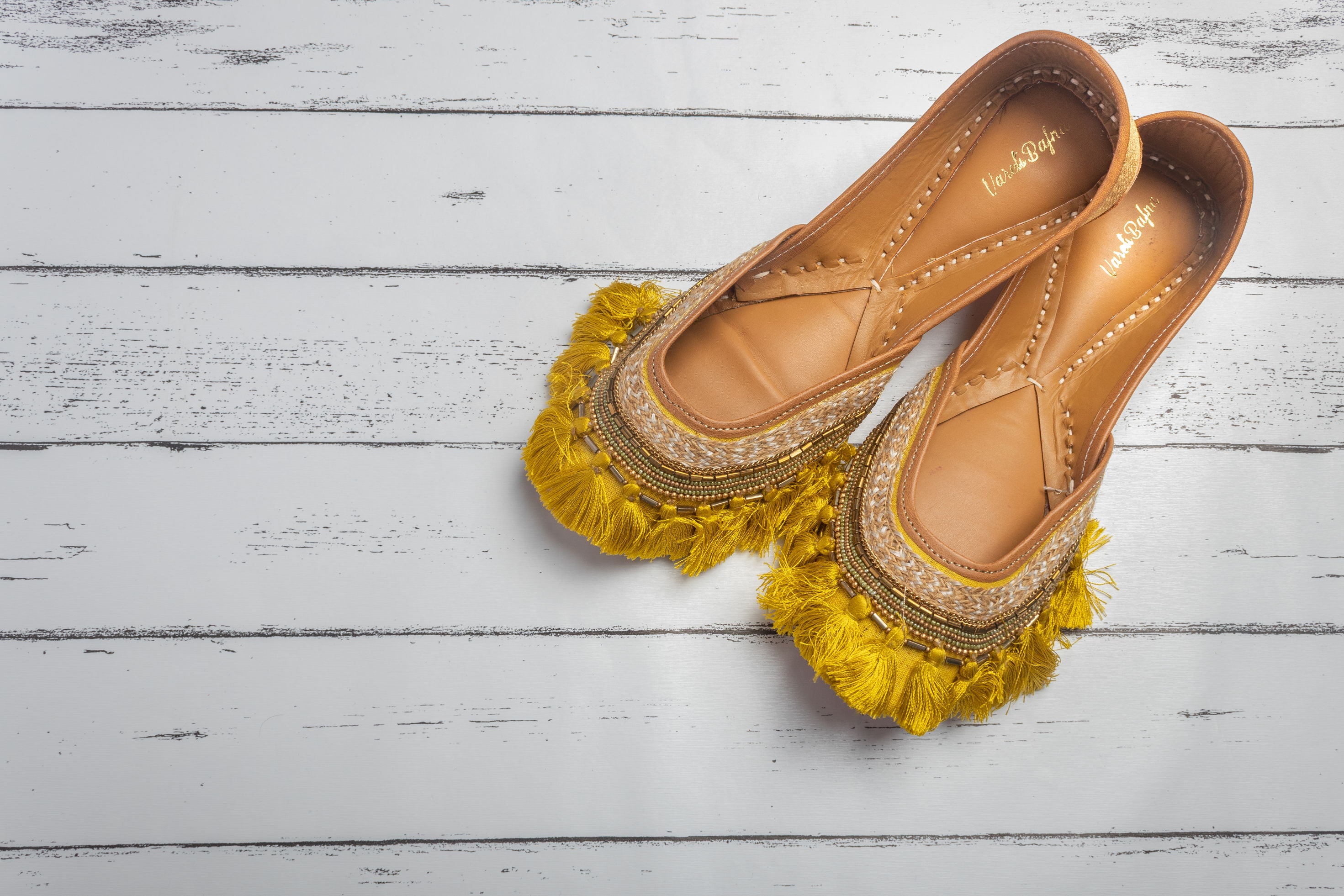 Yellow Hand embroidered Juttis