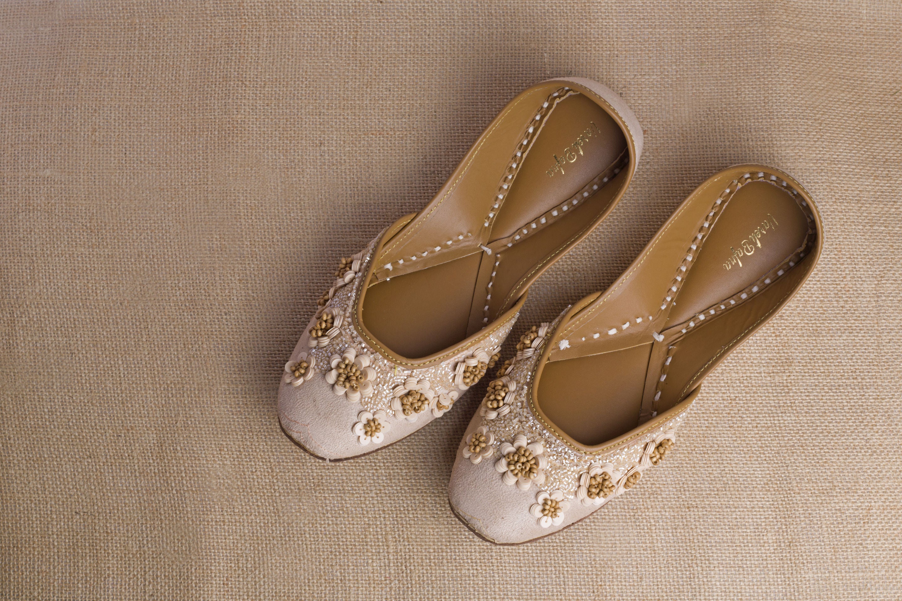 Beige Hand embroidered Juttis