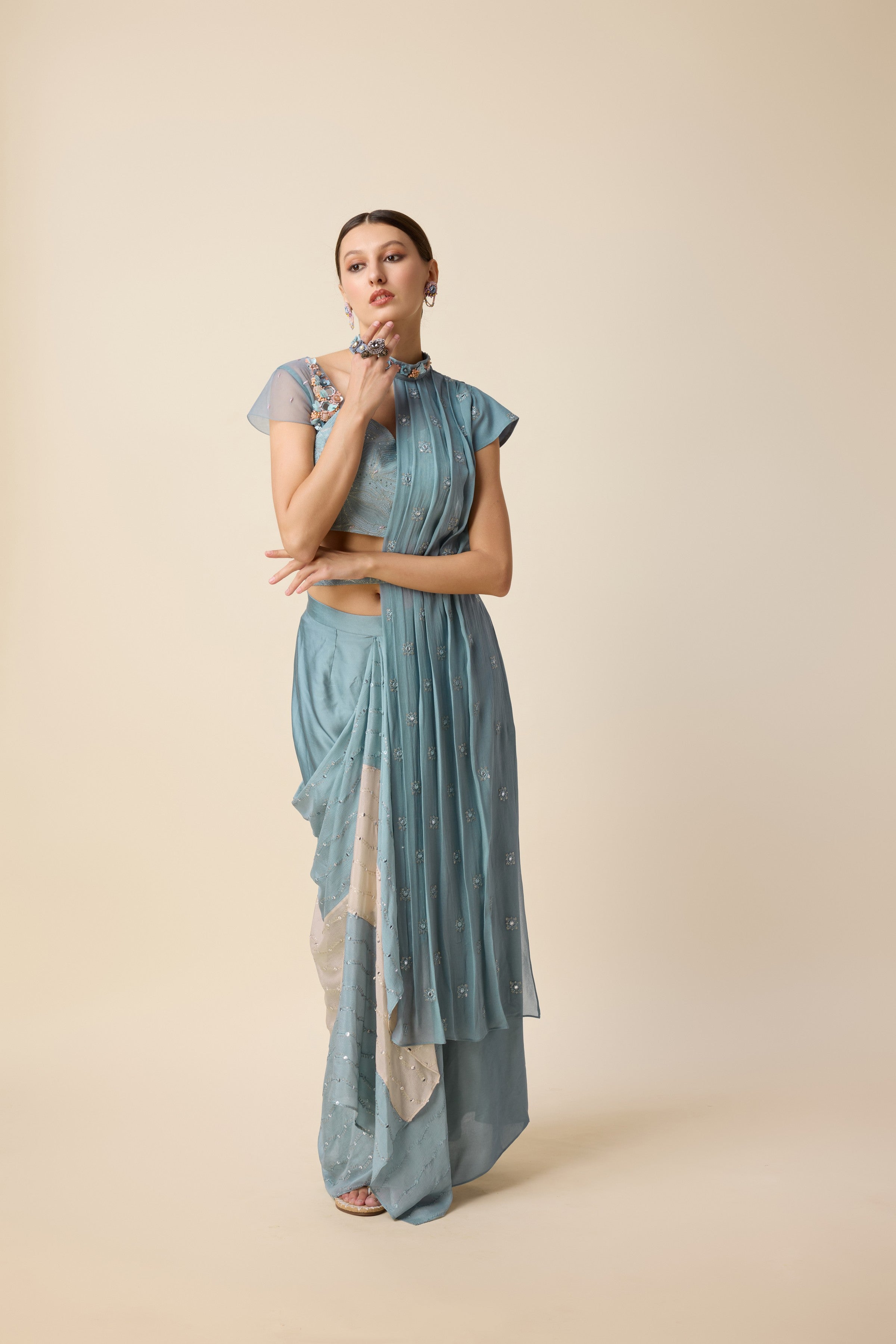 FUSION SAREE LOOK WITH DRAPE SKIRT AND ONE SIDED SHRUG.