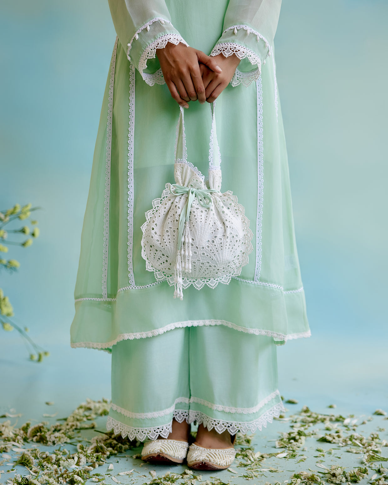 Mint Frost Schiffli Potli Bag with lace detailing and beaded tassels