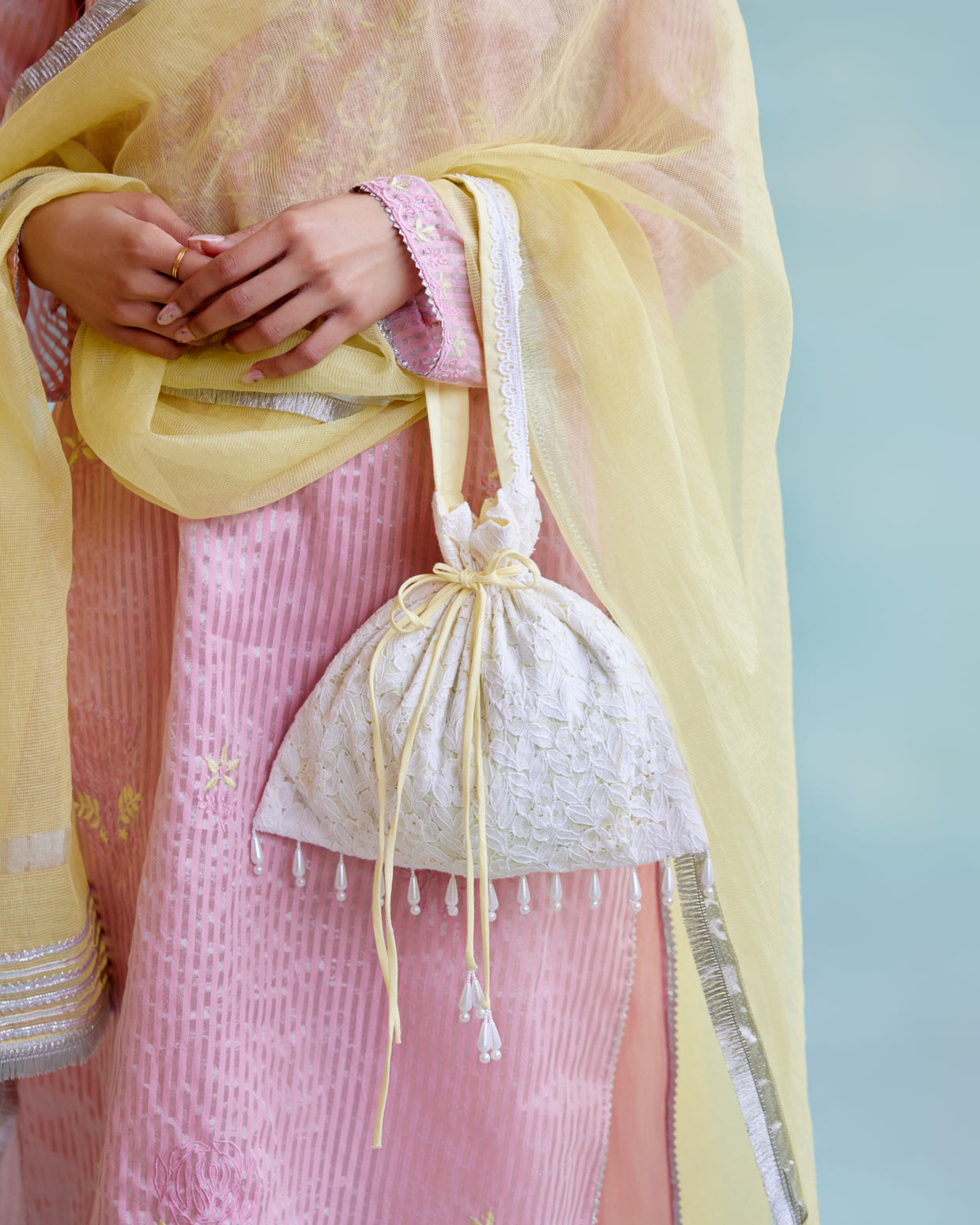 Sunny Lime Pearl Potli Bag with beads hanging and lace detailing for women