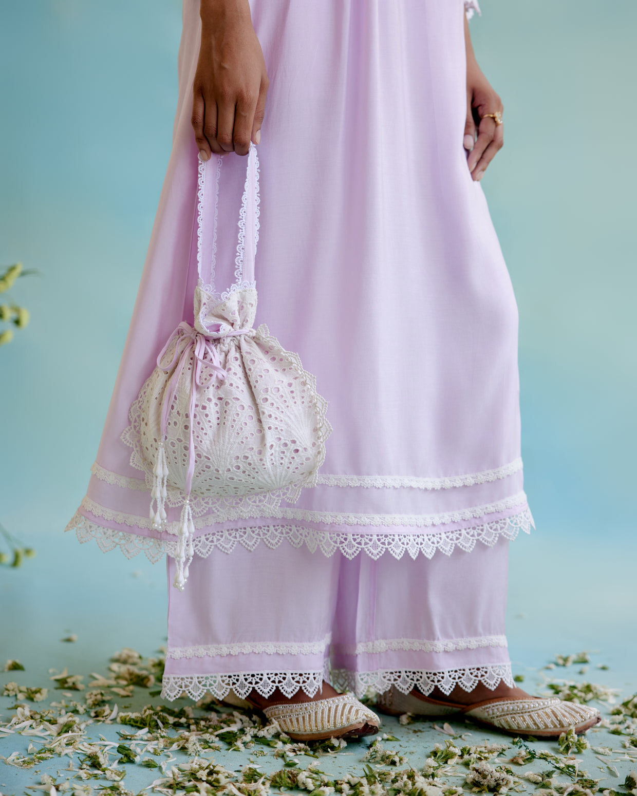 Lilac Glory Schiffli Potli Bag with lace detailing and beaded tassels for women