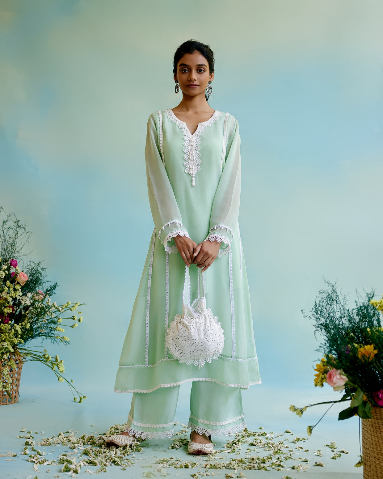 Mint Frost Schiffli Potli Bag with lace detailing and beaded tassels