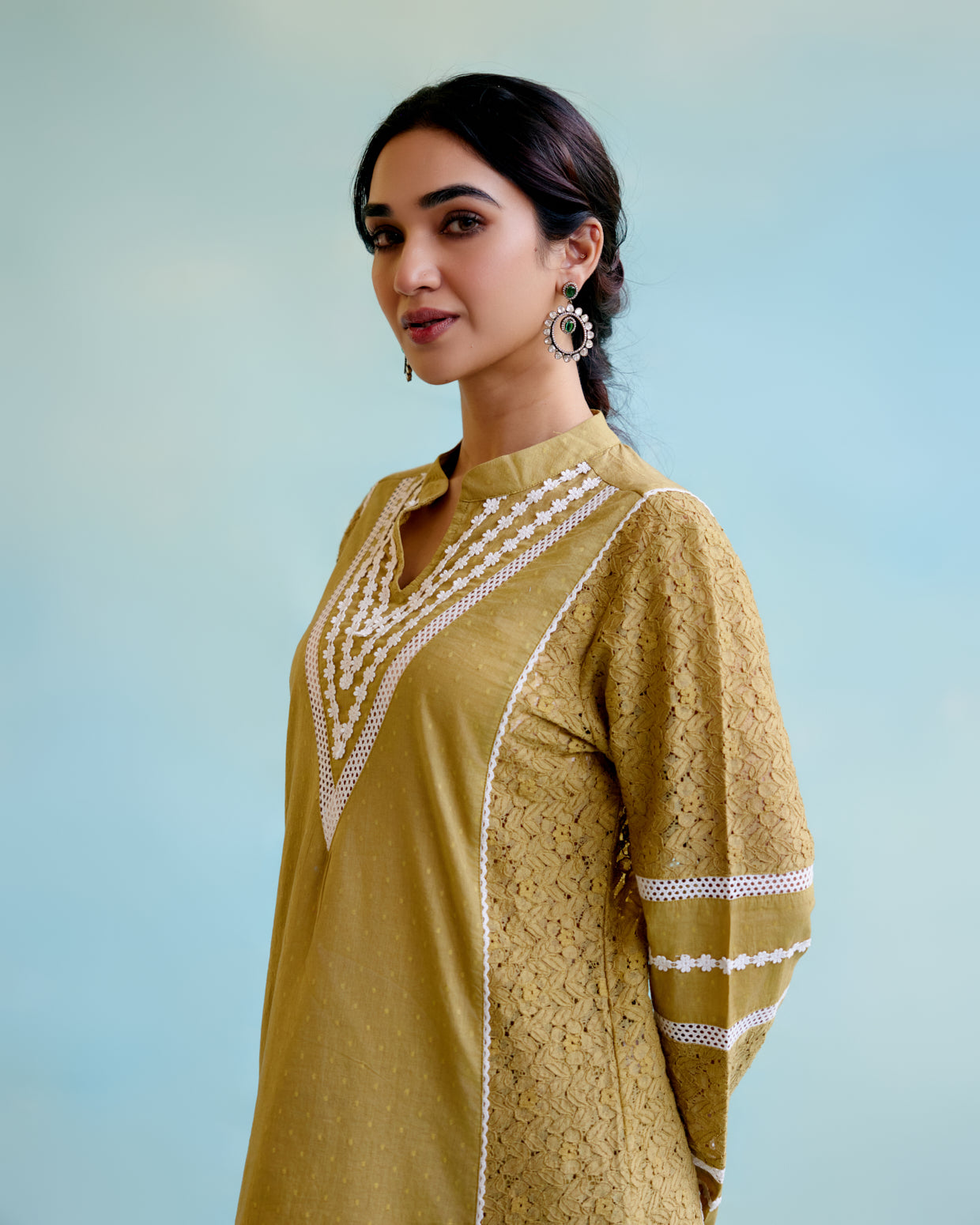 Olive Brown Kurta in Cotton Dobby and Schiffli fabric with Delicate Lace Detaling with Narrow Pants