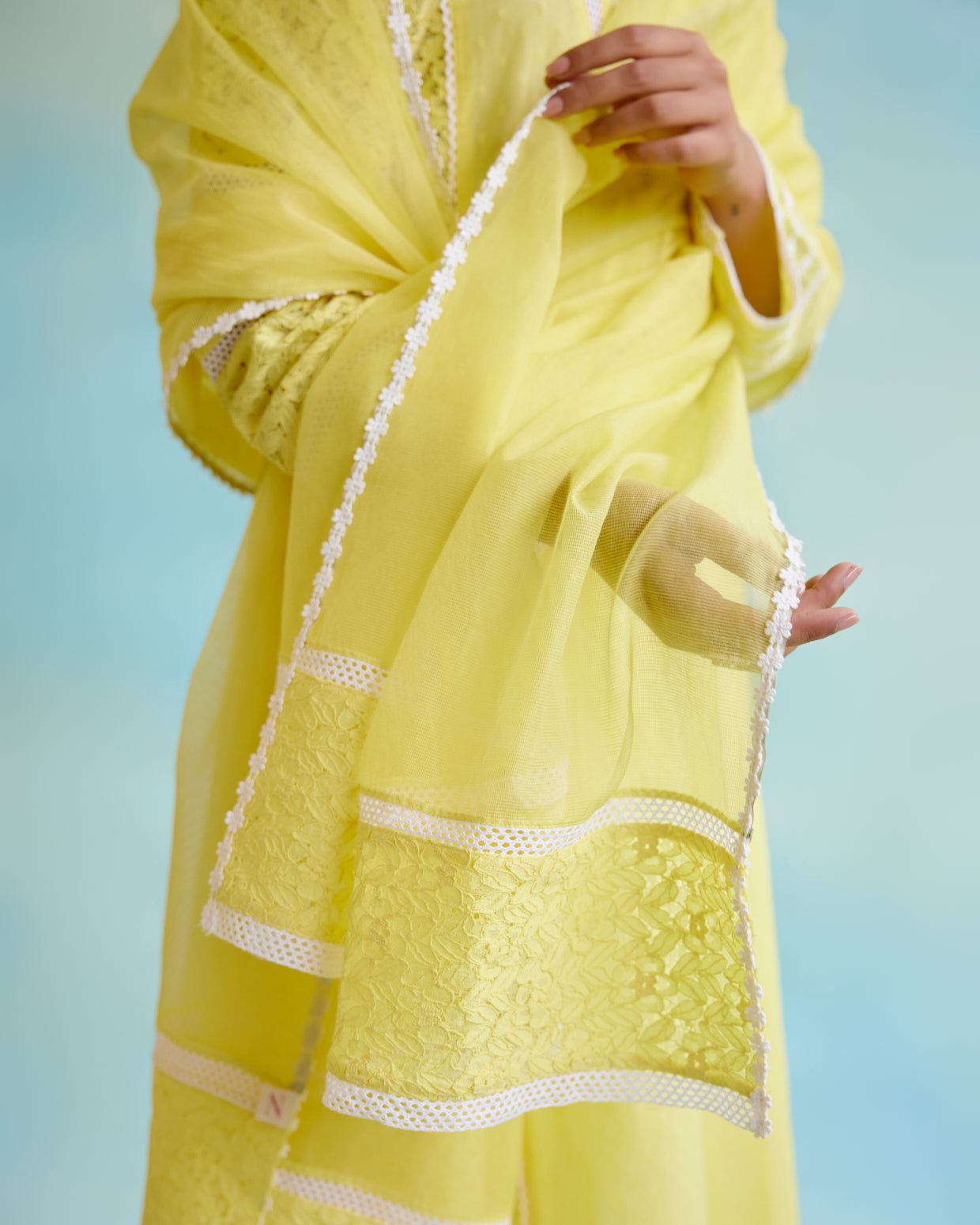 Daylily Kurta in Cotton Dobby and Schiffli fabric with Delicate Lace Detaling with Narrow Pants