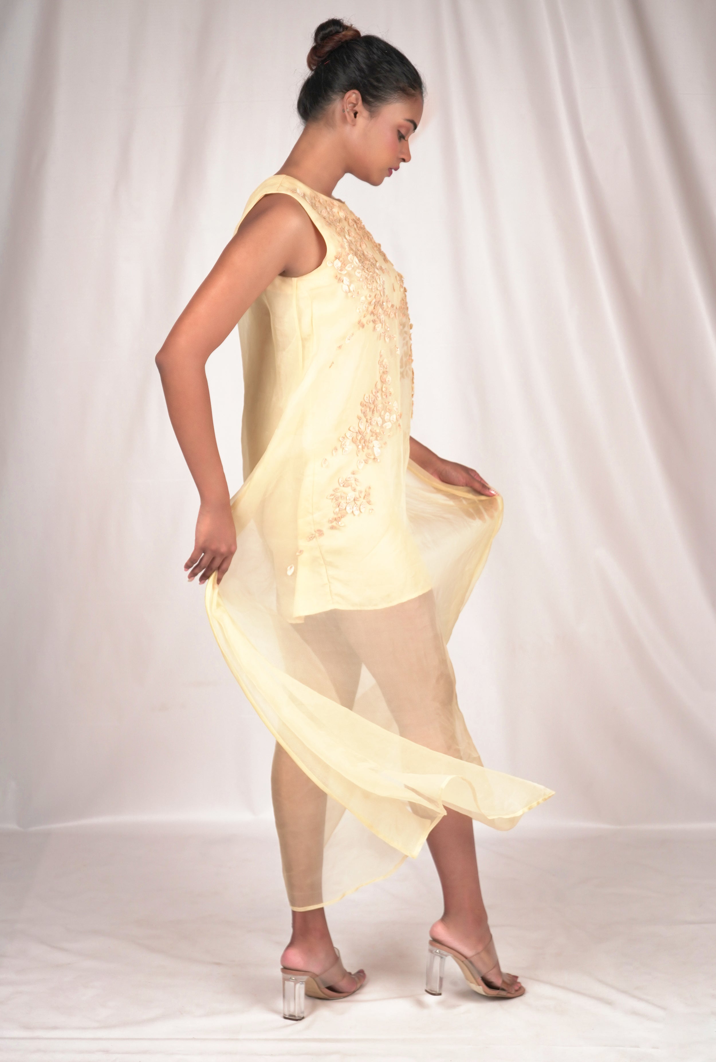 Yellow hued organza dress with gold sequin highlights