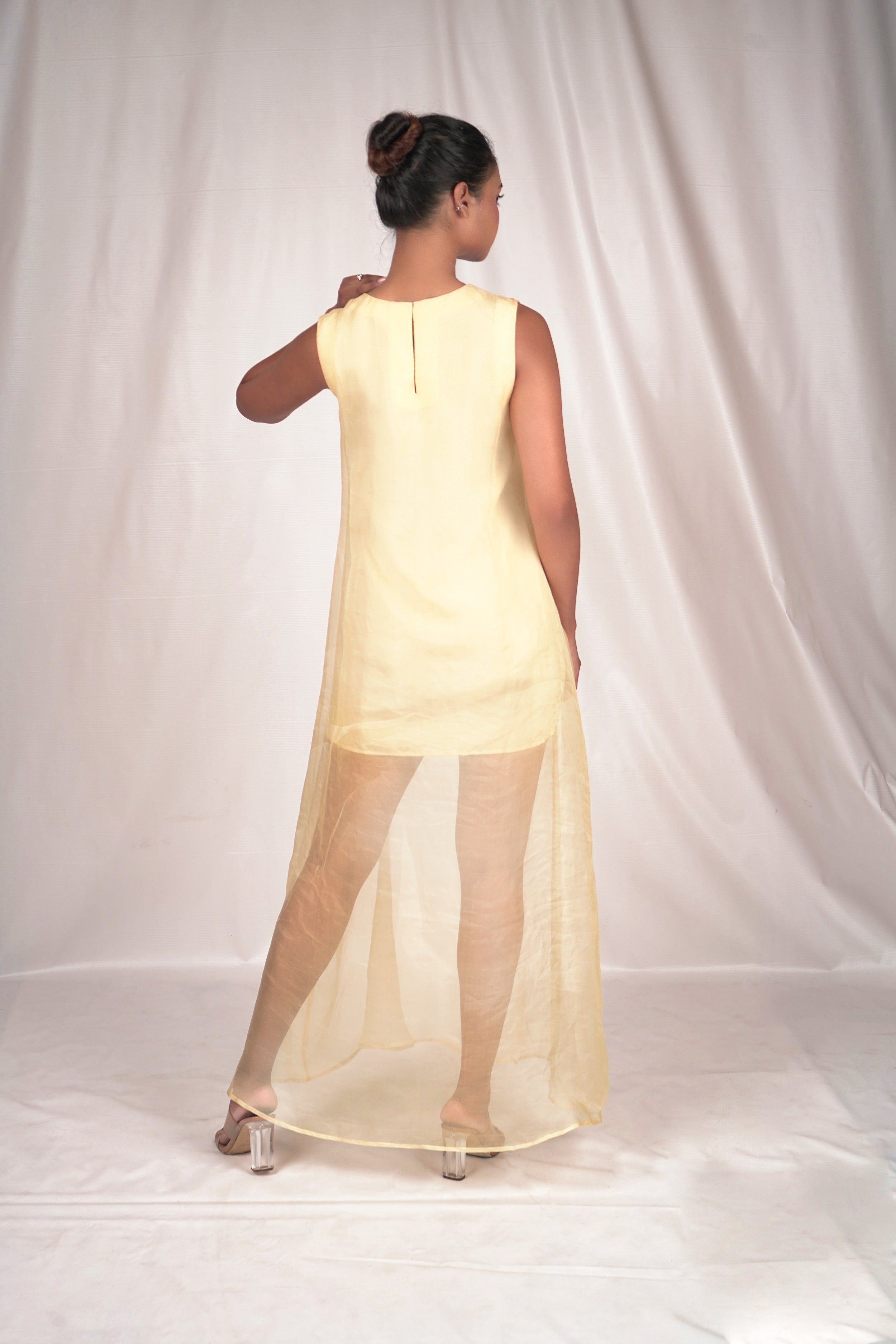 Yellow hued organza dress with gold sequin highlights