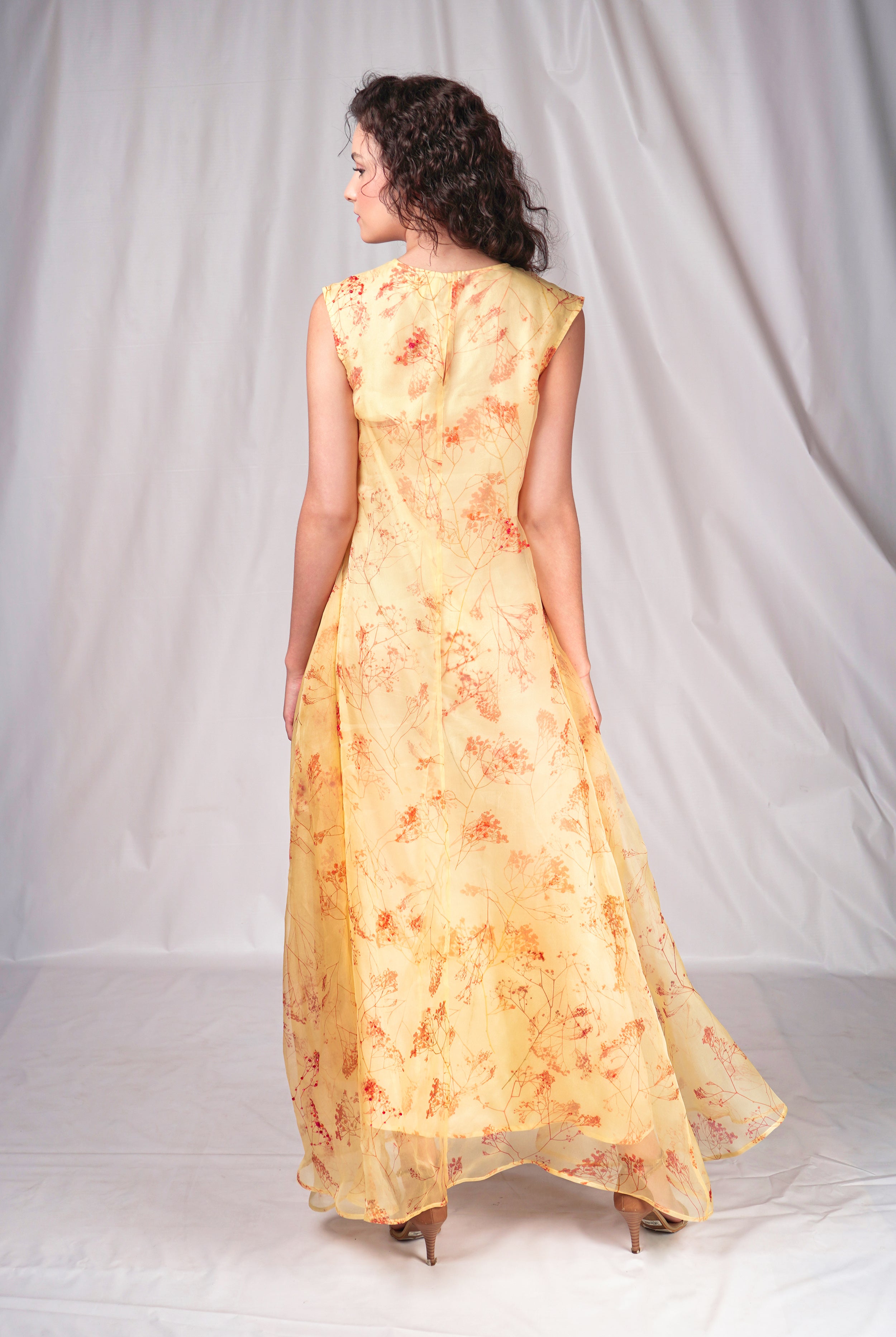 Yellow long dress with shibori print and embroidery details