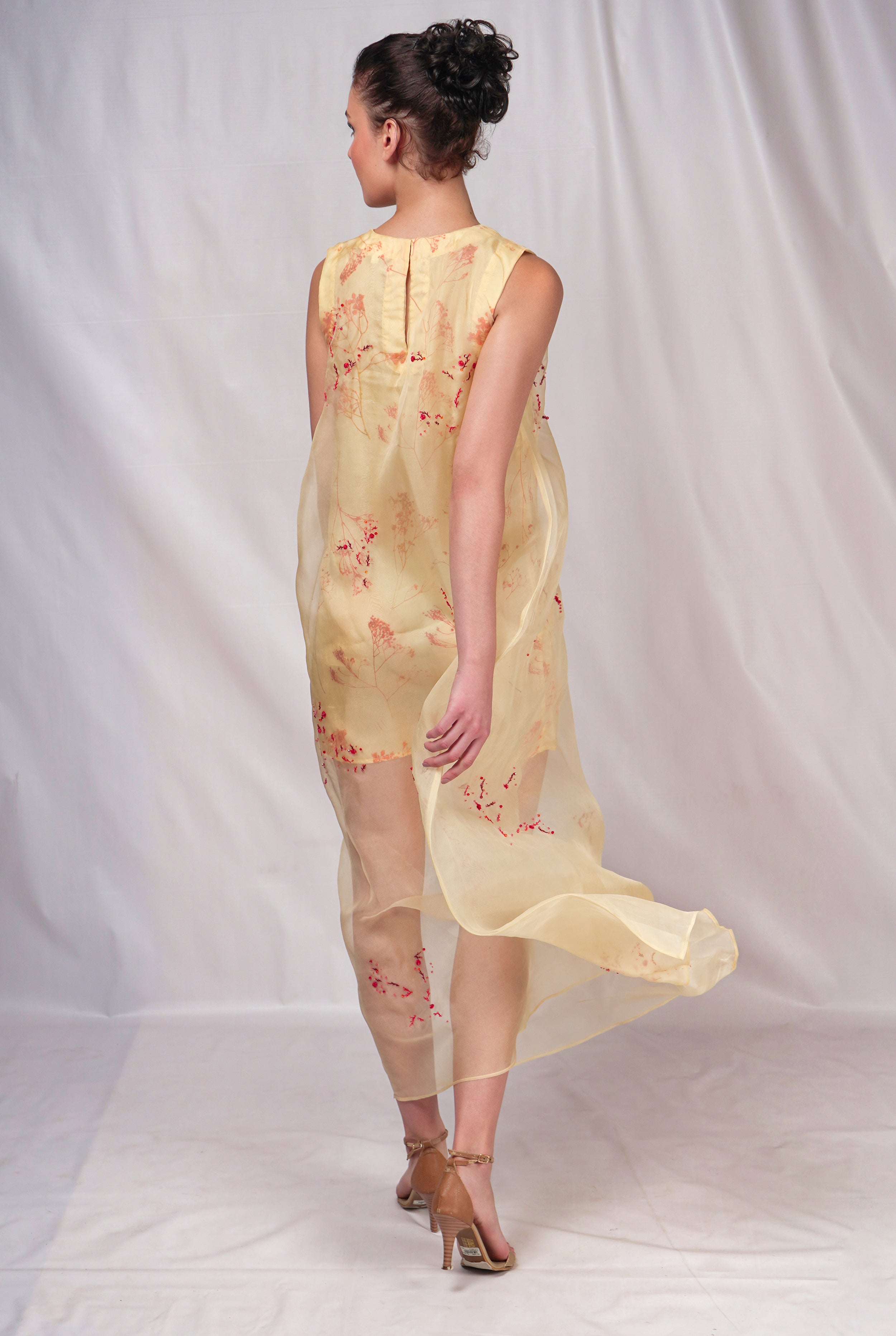 Yellow hued organza dress with embroidery details