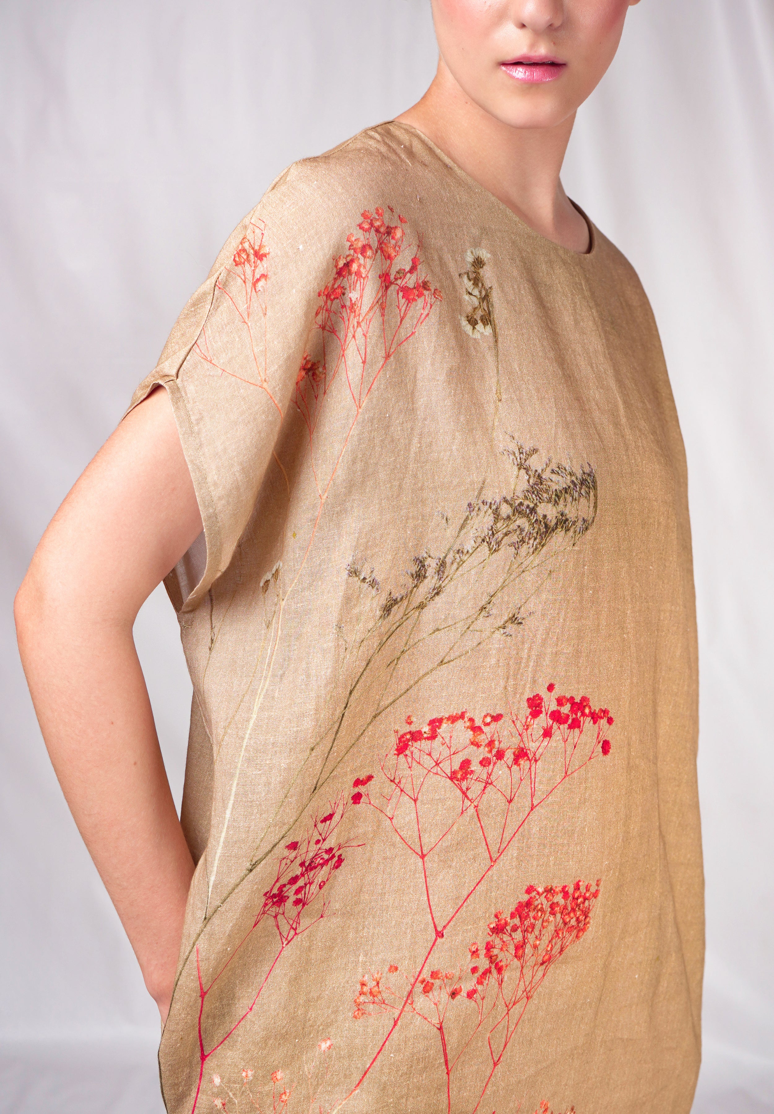 Light brown floral printed dress with  motifs