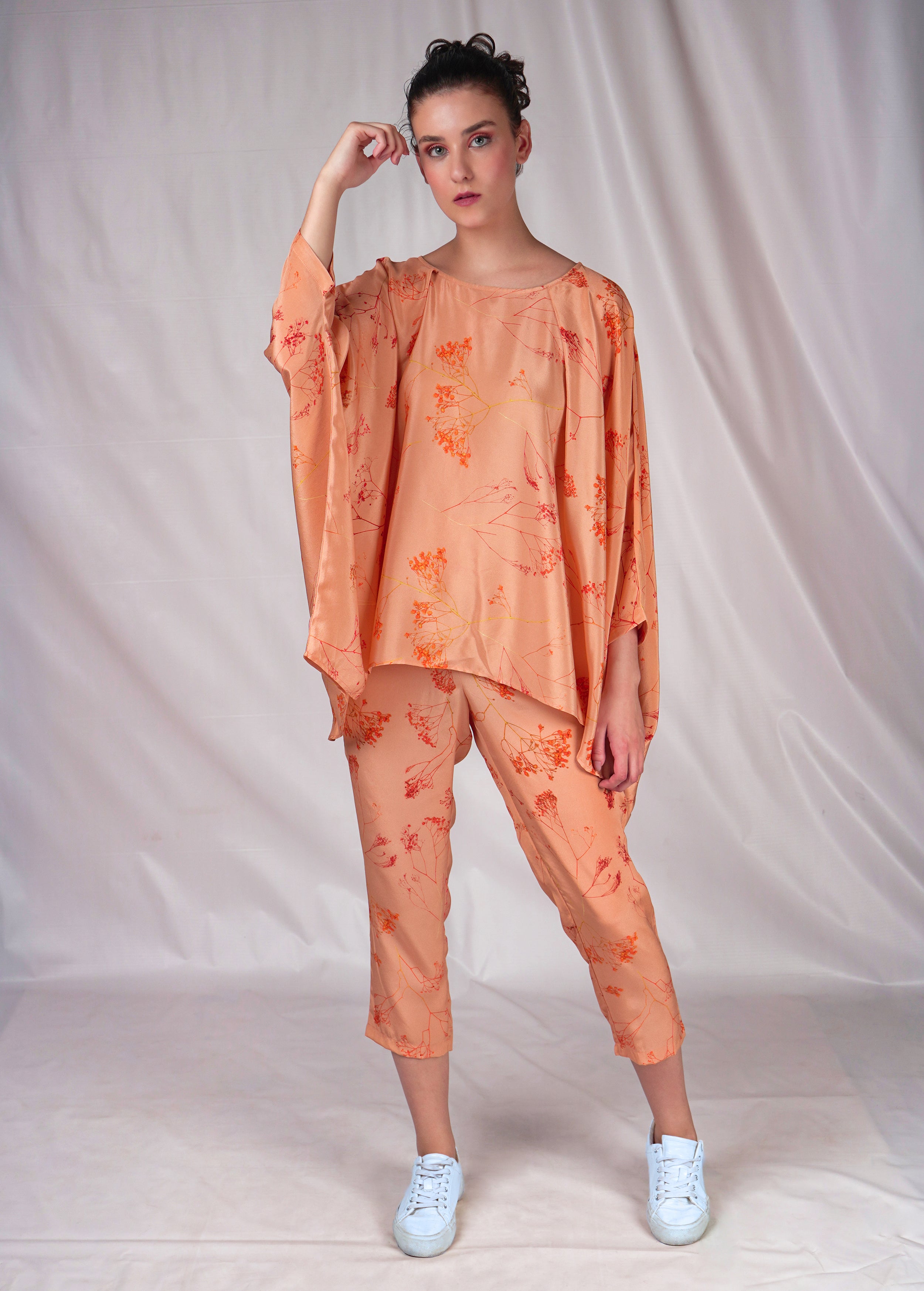 Pink embroidered top with kimono sleeves