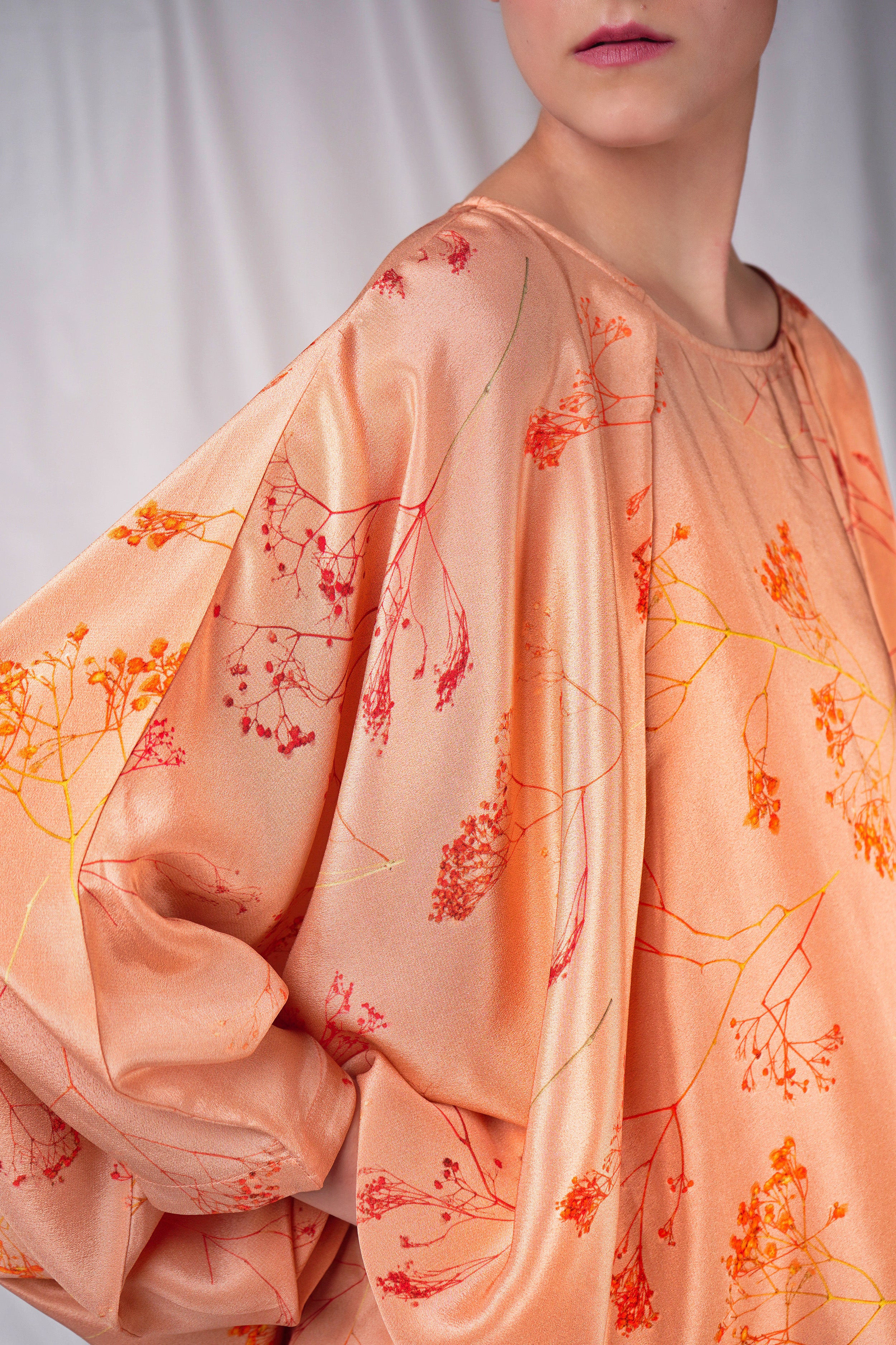 Pink embroidered top with kimono sleeves