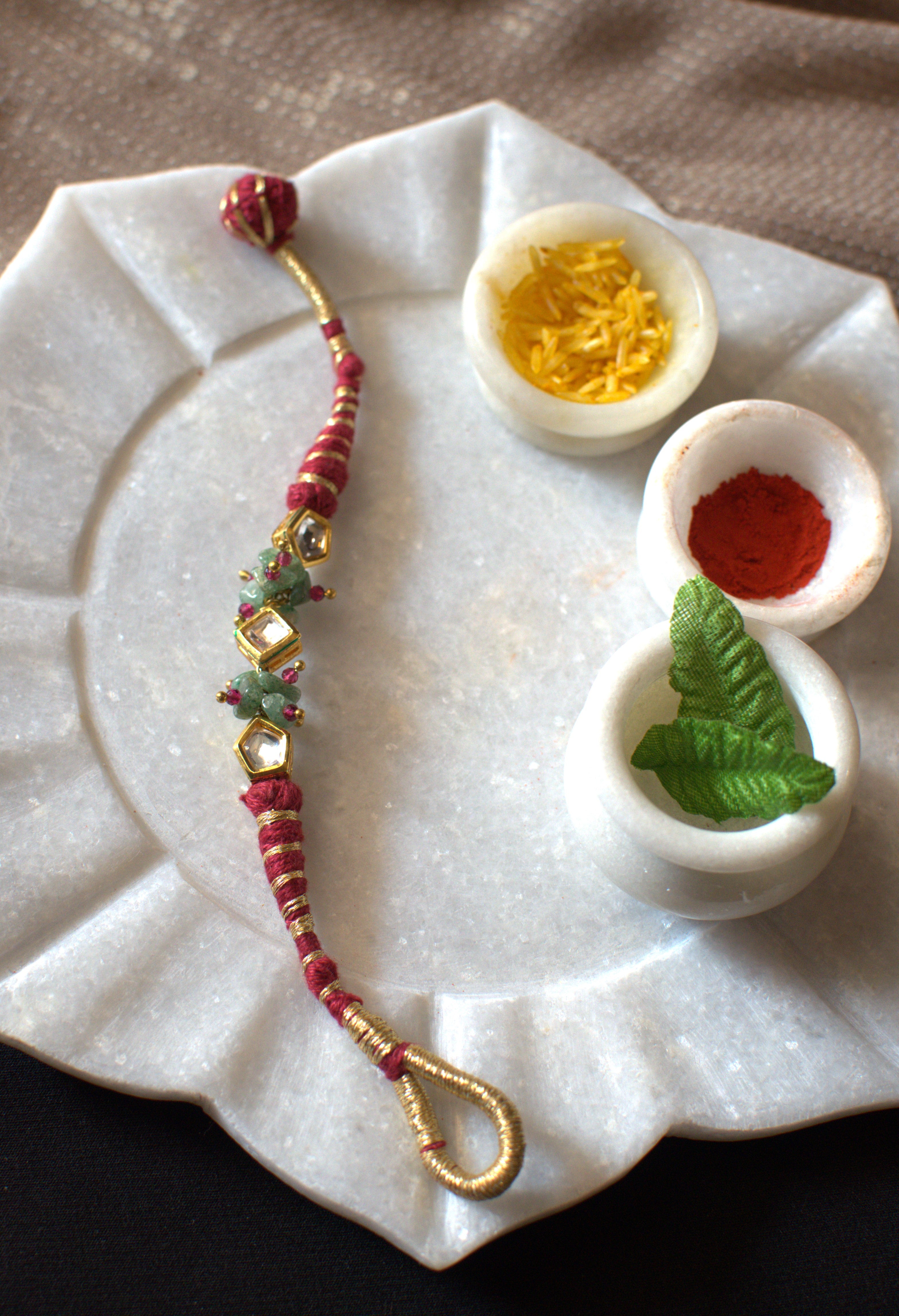 Red polki gravel rakhi bracelet