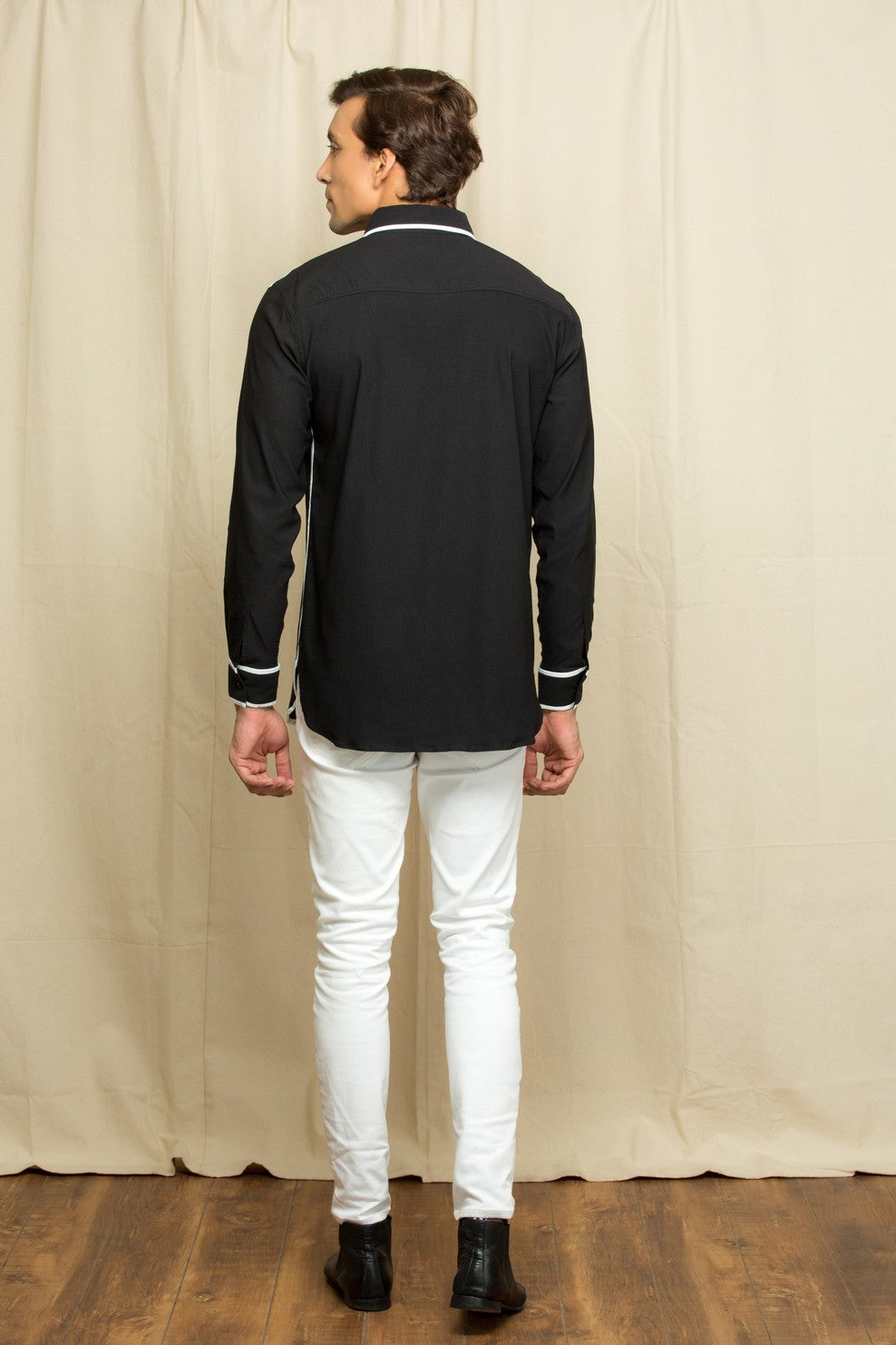 Black shirt with white piping on collar placket and sleeves