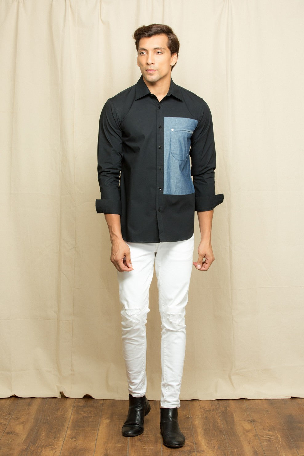 Black shirt with rectangular denim patch with denim pocket