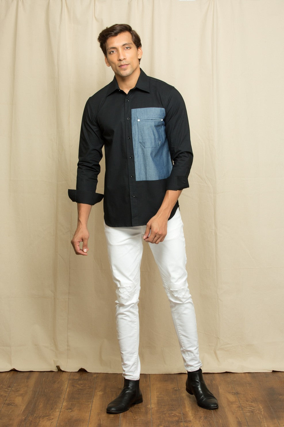 Black shirt with rectangular denim patch with denim pocket