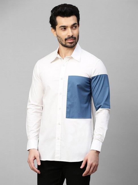 White shirt with slate blue patch on left sleeve and chest with button detailing