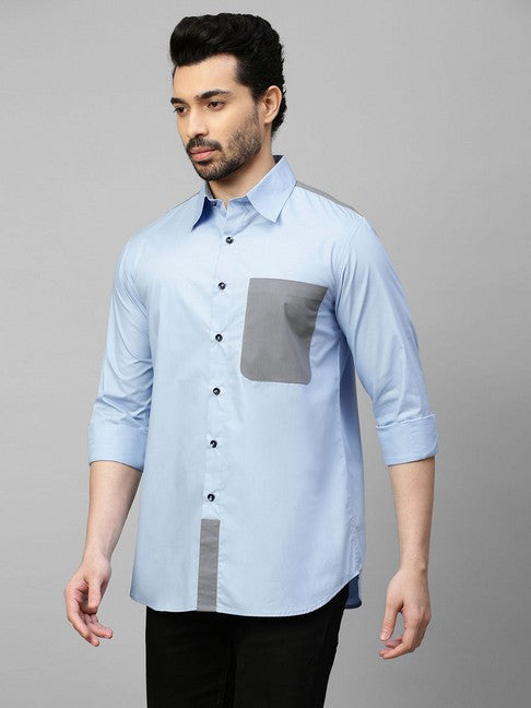 Light blue shirt with gray straps on shoulders, pocket and plaket