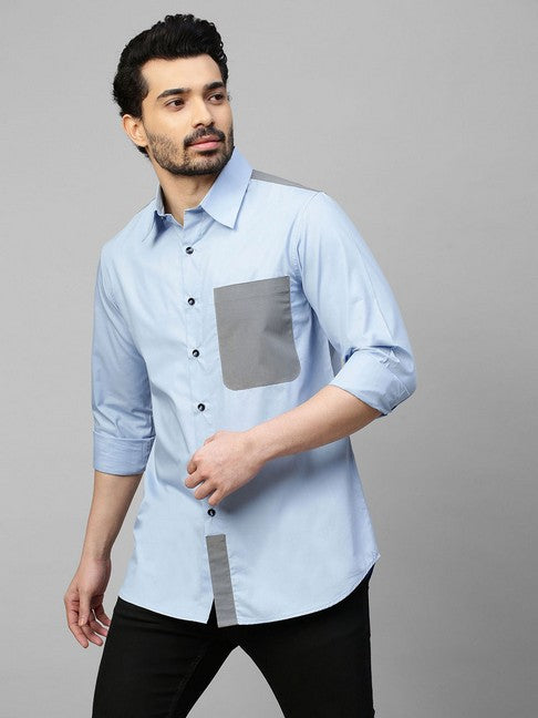 Light blue shirt with gray straps on shoulders, pocket and plaket