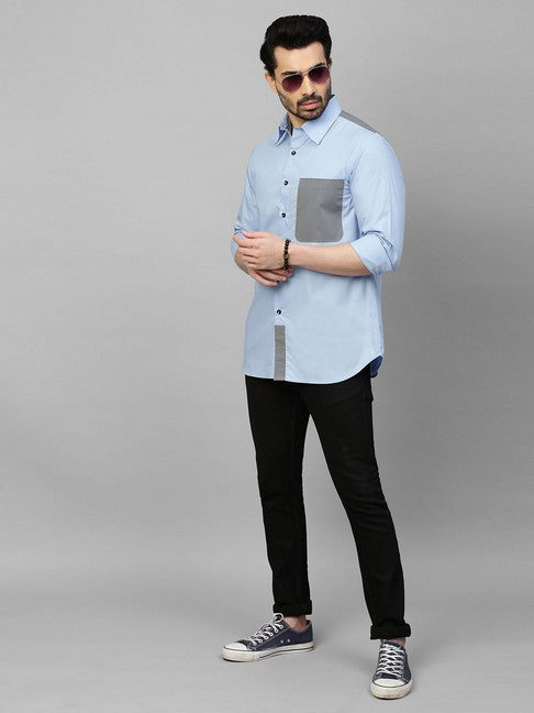 Light blue shirt with gray straps on shoulders, pocket and plaket