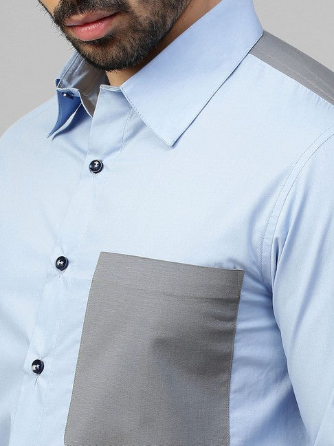 Light blue shirt with gray straps on shoulders, pocket and plaket