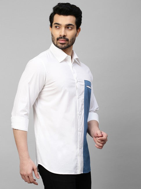 White shirt with slate blue patch on one side with slit pocket feature