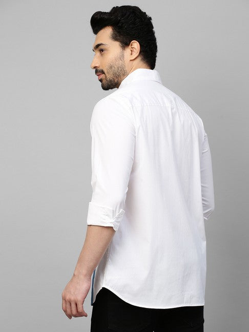 White shirt with slate blue patch on one side with slit pocket feature