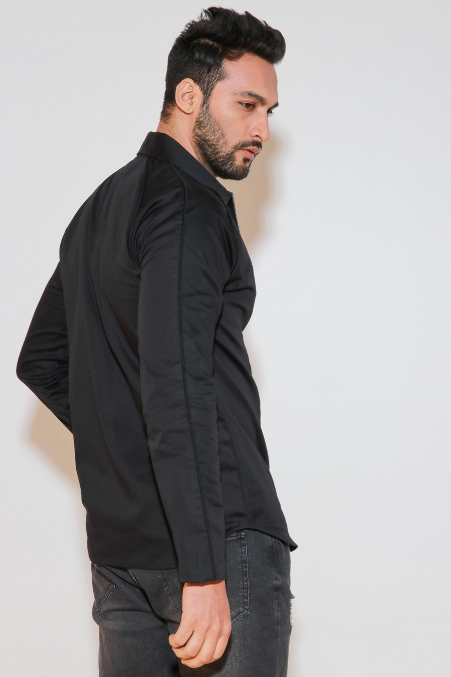 Black shirt with self piping on shoulders and zippered placket