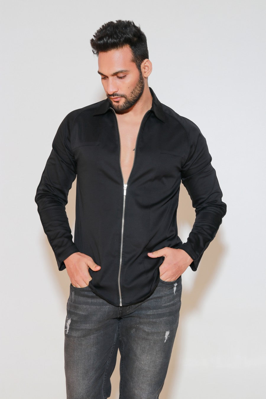 Black shirt with self piping on shoulders and zippered placket