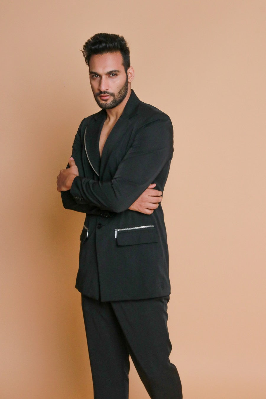 Black jacket with zippers and narrow fitted pants