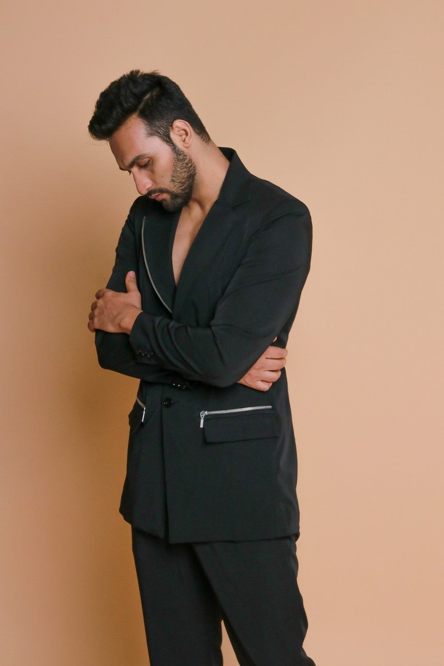 Black jacket with zippers and narrow fitted pants