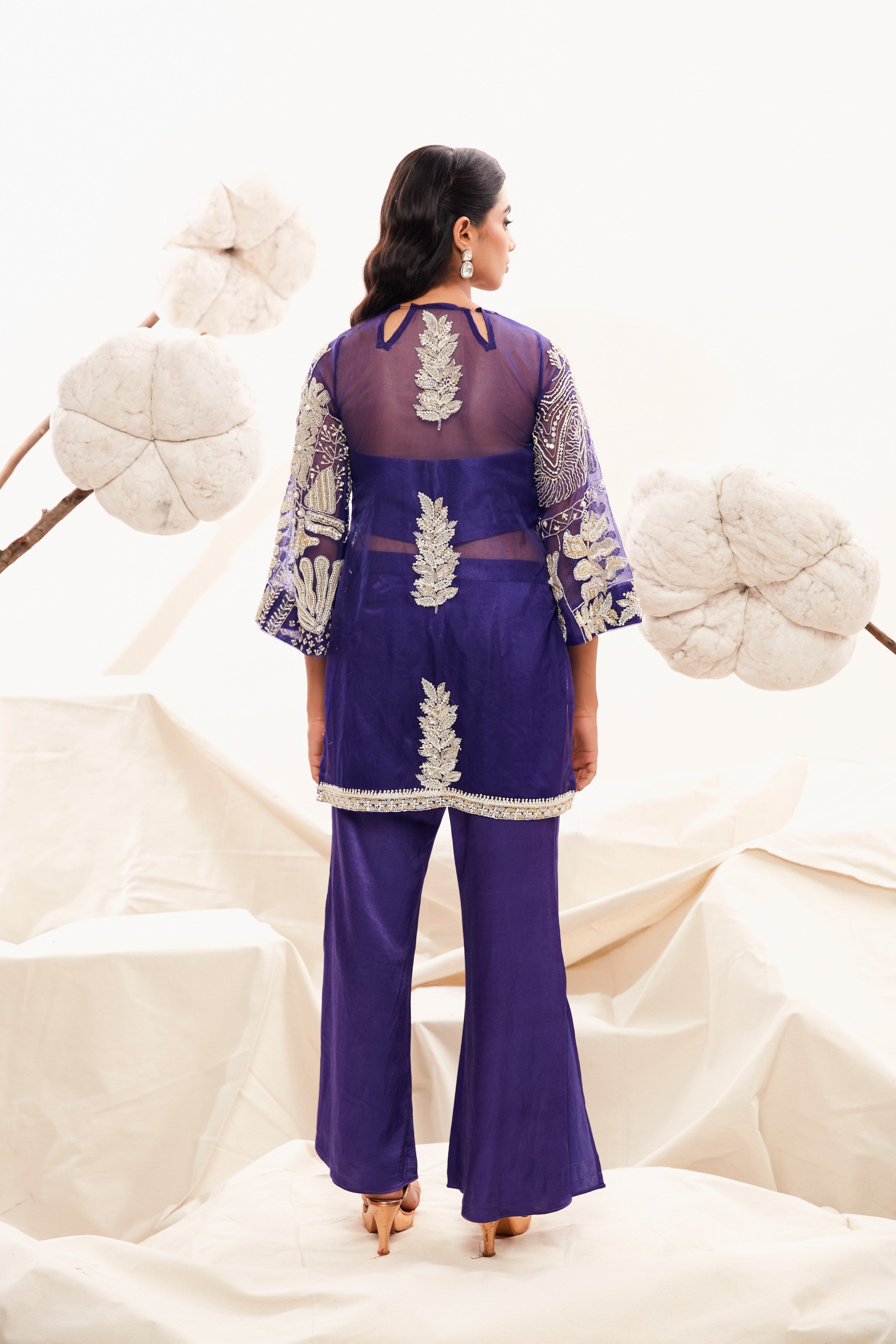 Intricately embroidered kurta with glamorous slit pants