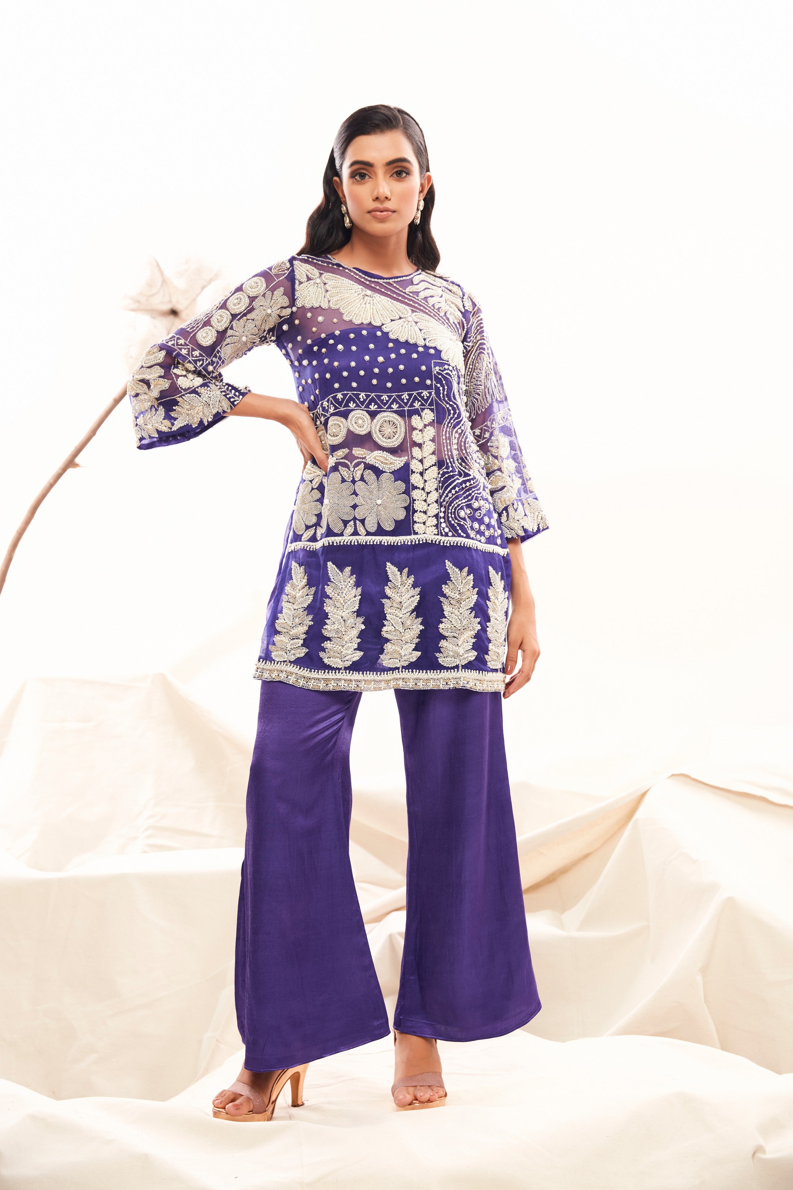 Intricately embroidered kurta with glamorous slit pants