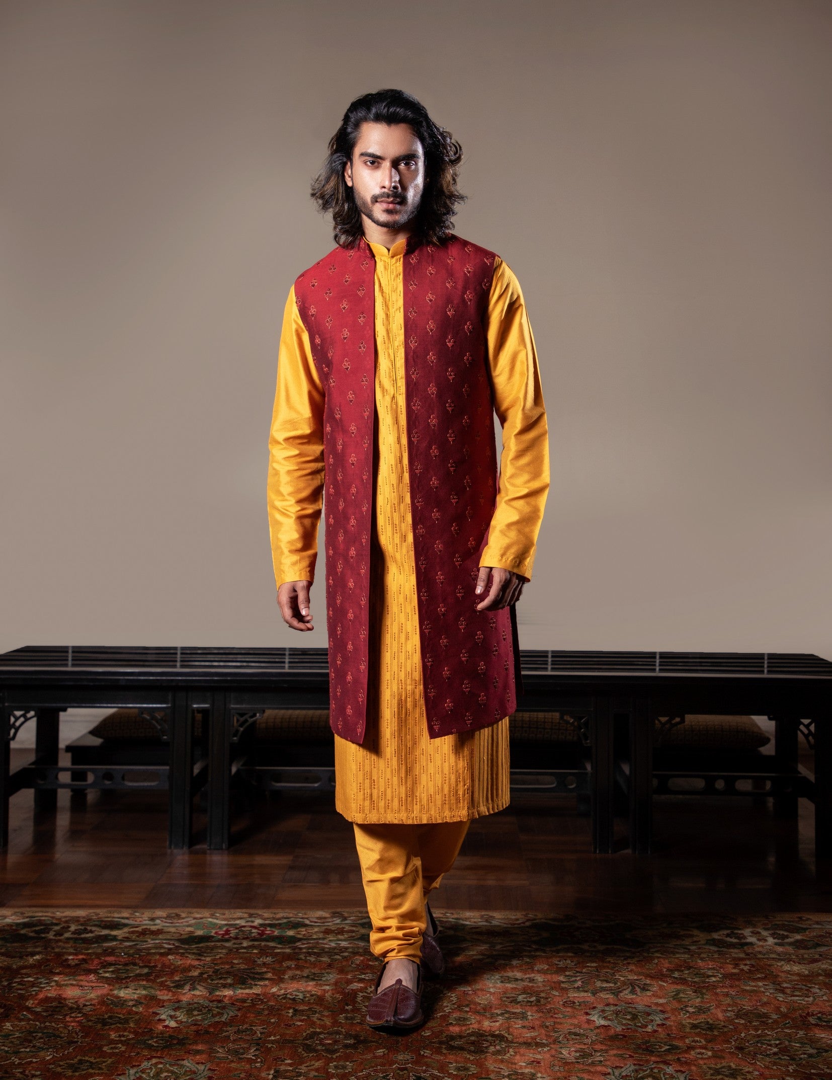 Honey yellow thin pleats kurta and churidar with Maroon embroidered jacket