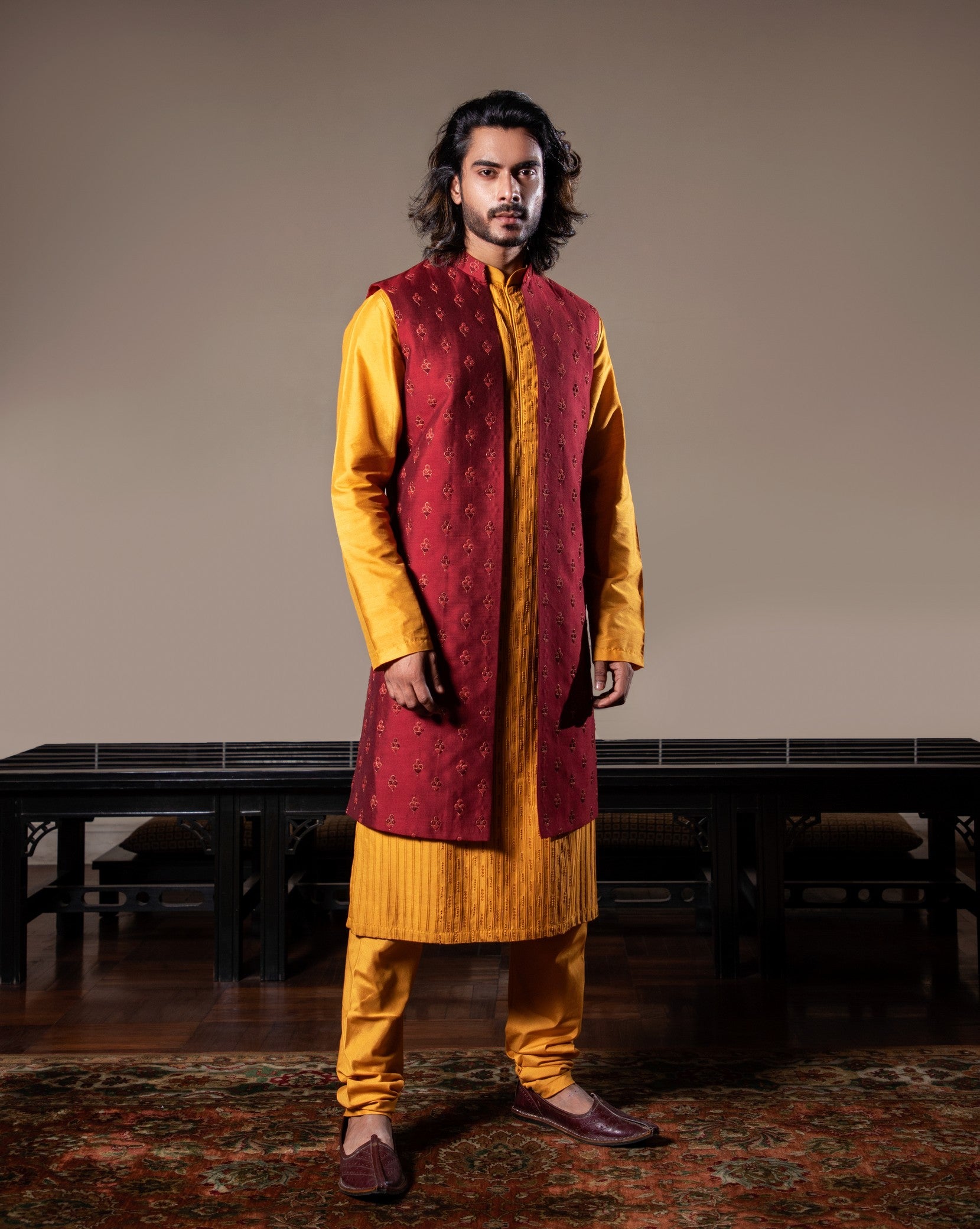 Honey yellow thin pleats kurta and churidar with Maroon embroidered jacket