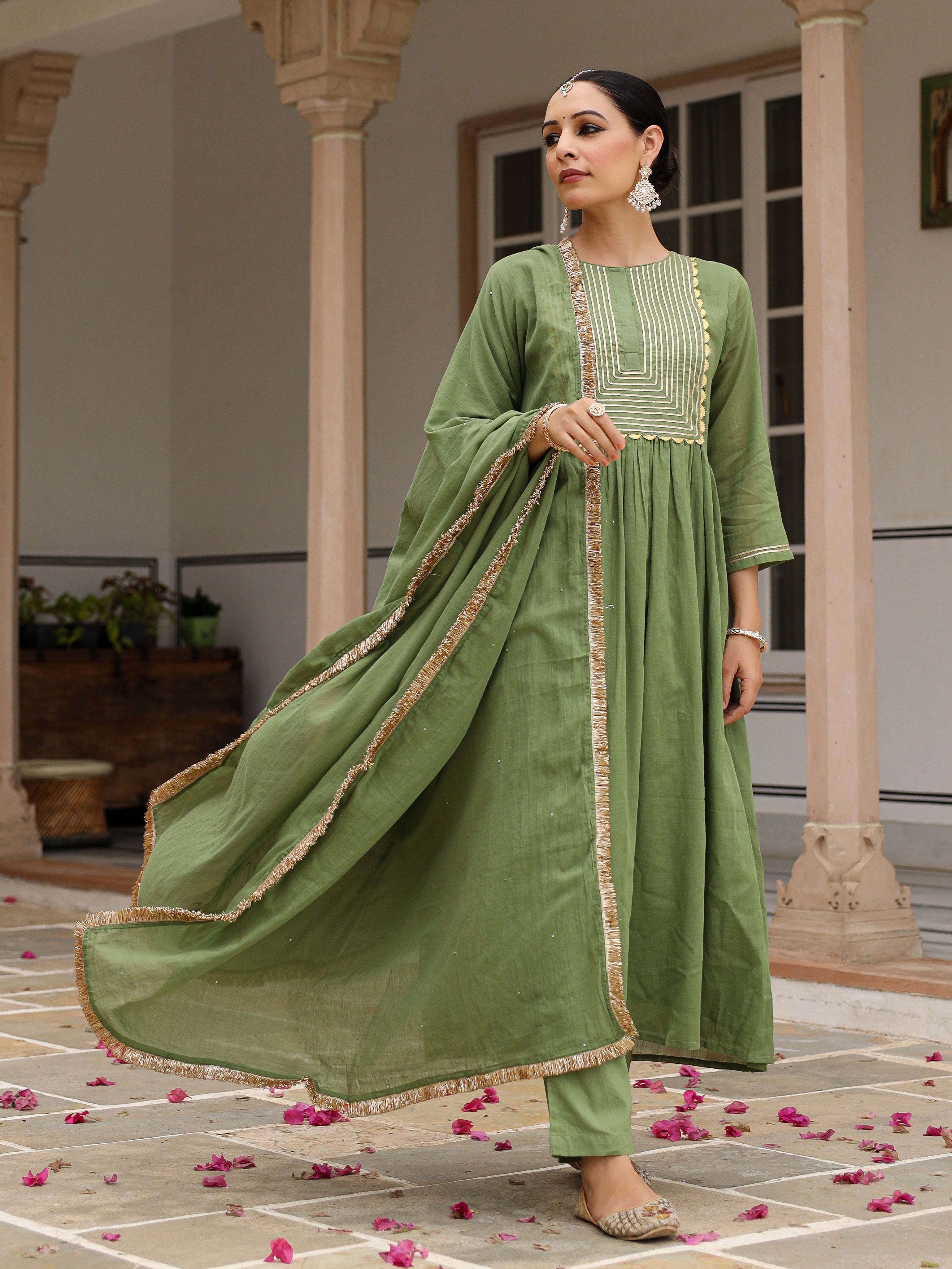 Light green mulmul cotton anarkali kurta set with trousers and dupatta