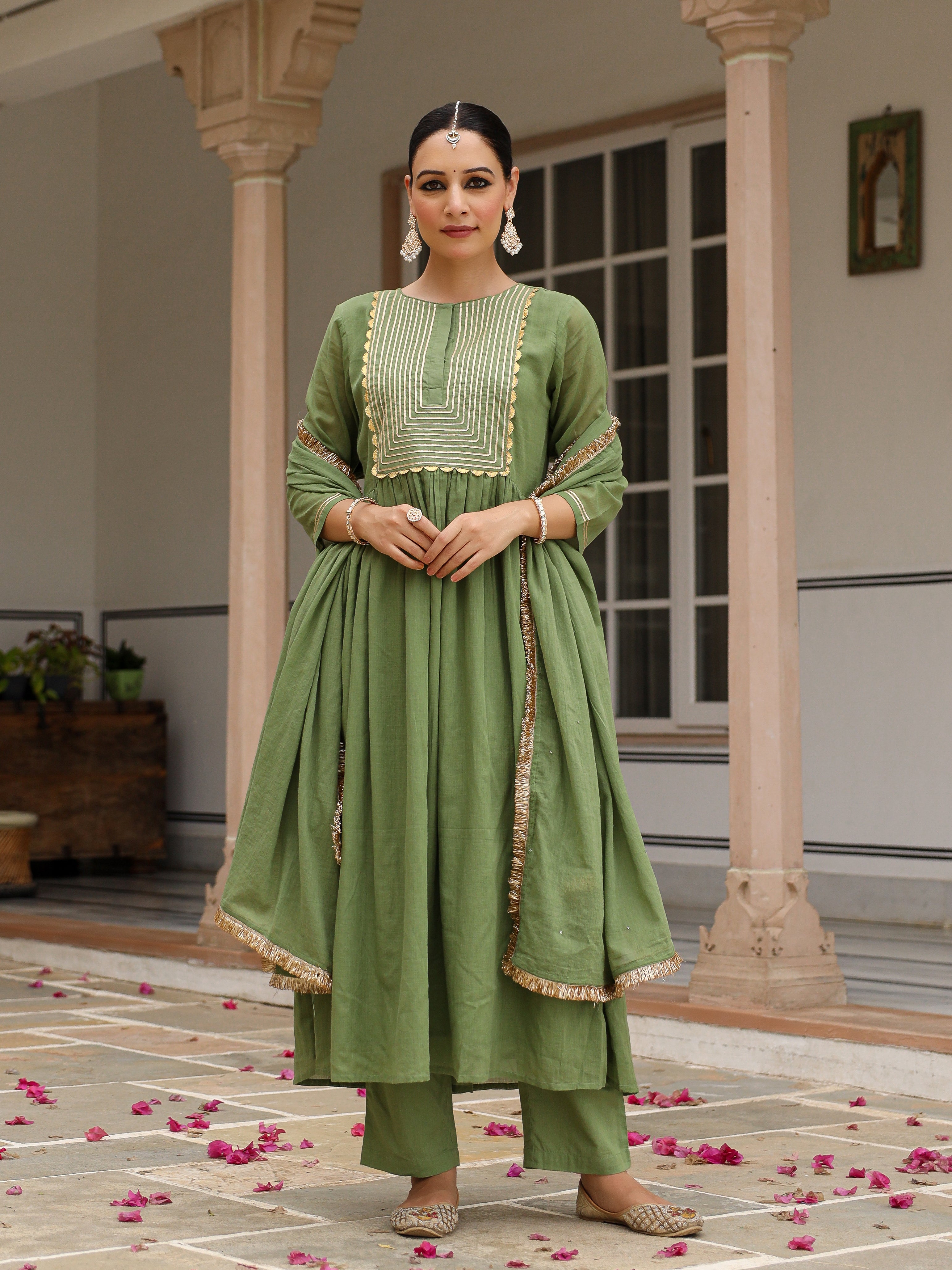 Light green mulmul cotton anarkali kurta set with trousers and dupatta