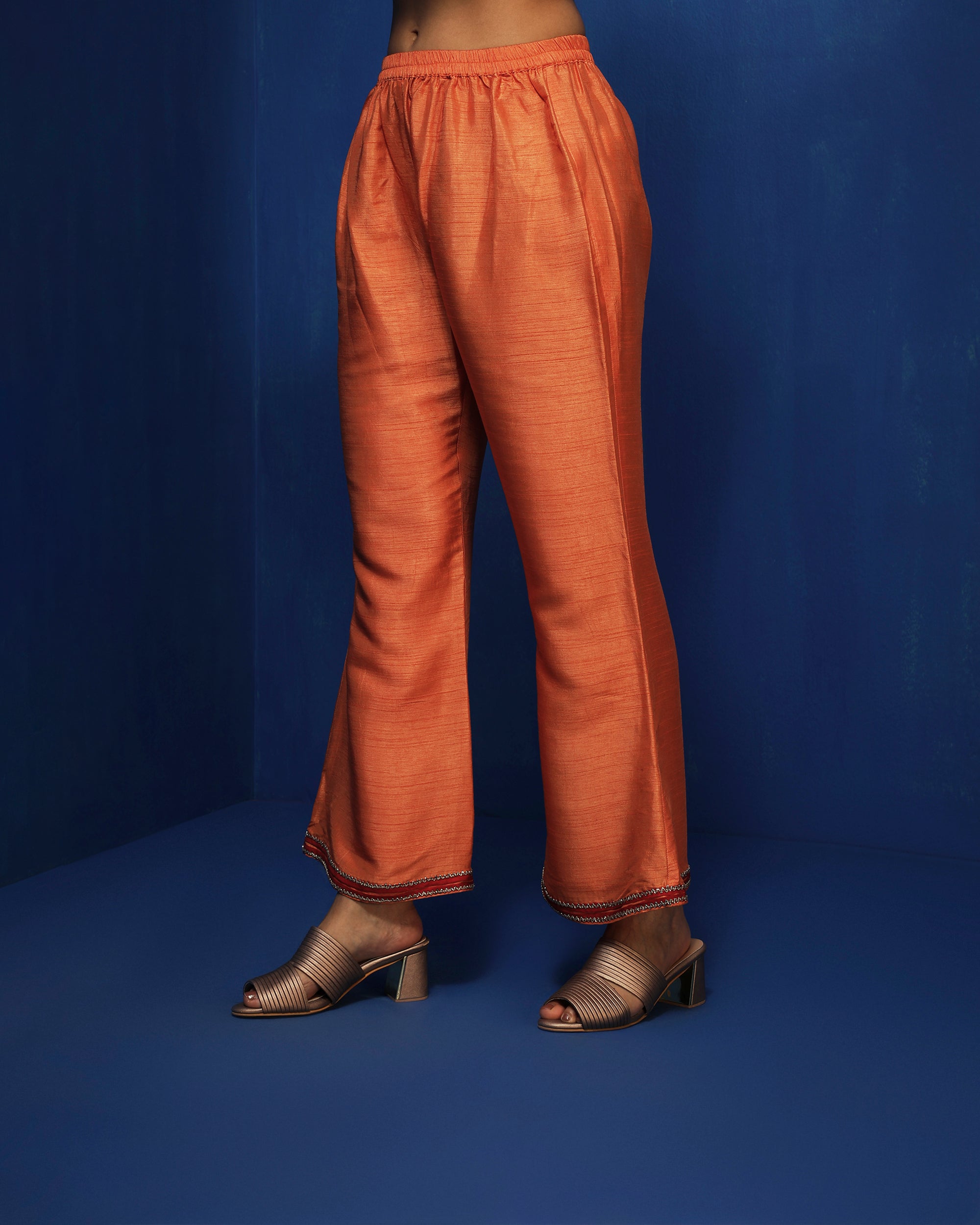 Orange bell bottom pants