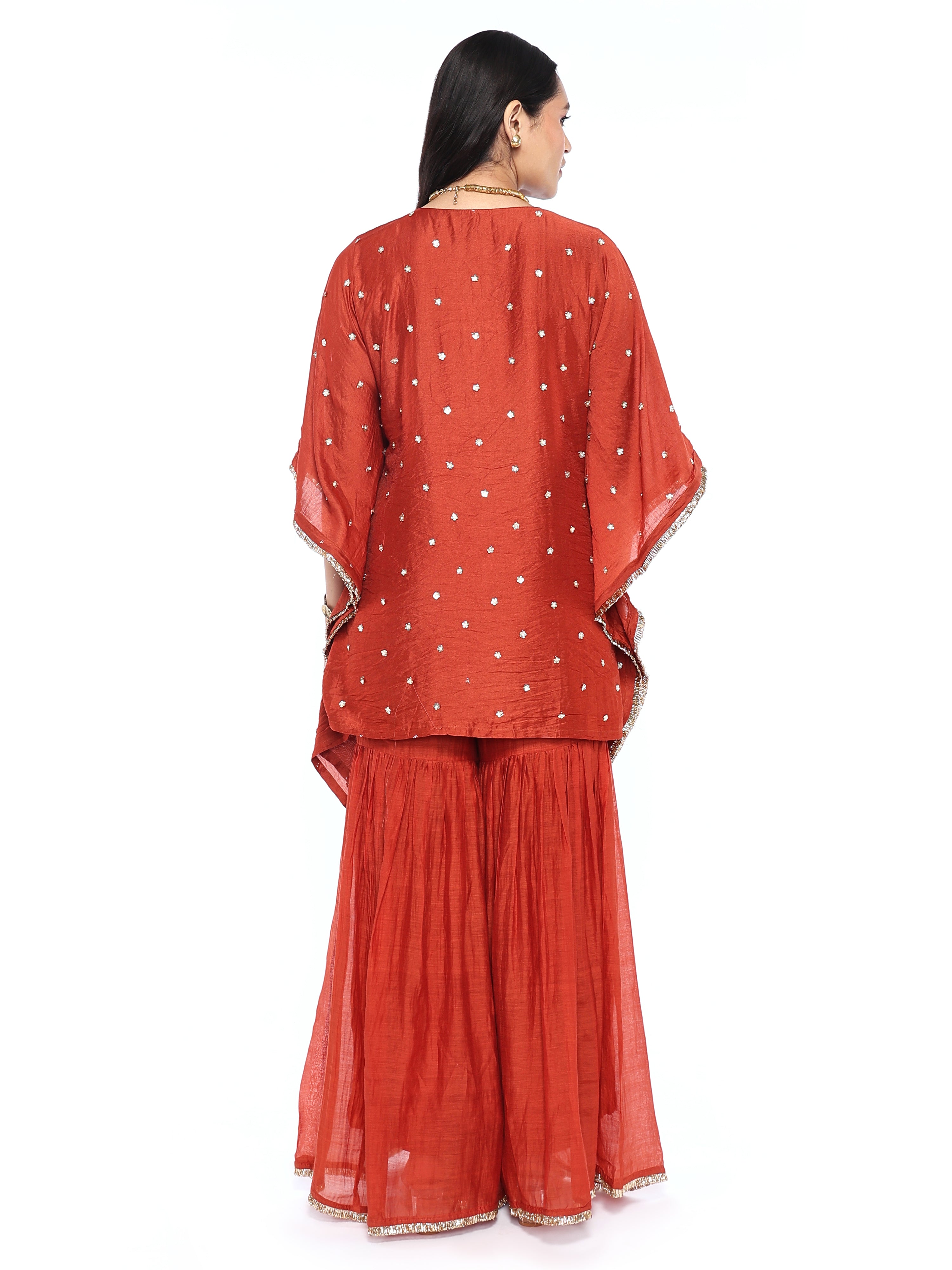 Short kaftan paired with garara pants