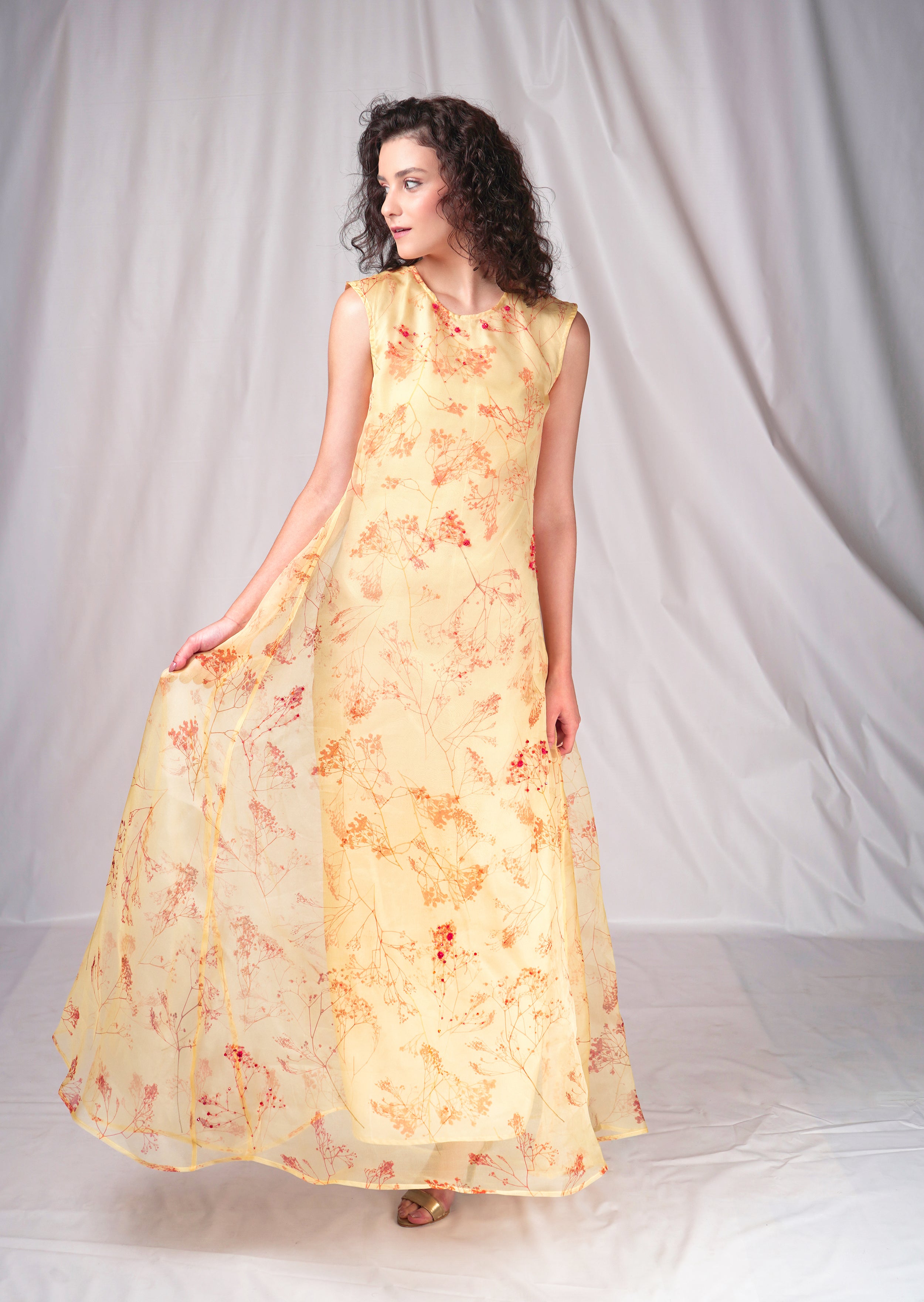 Yellow long dress with shibori print and embroidery details