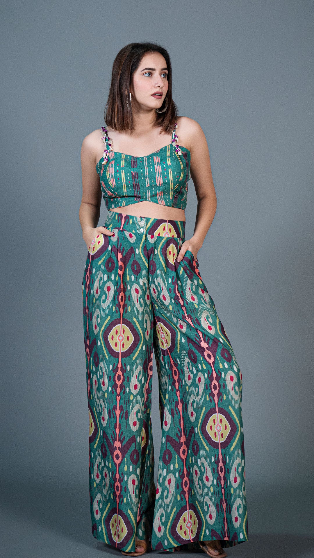 GREEN IKKAT PRINT PLEATED PANTS IN SILK + SILK EMBELLISHED CROP TOP