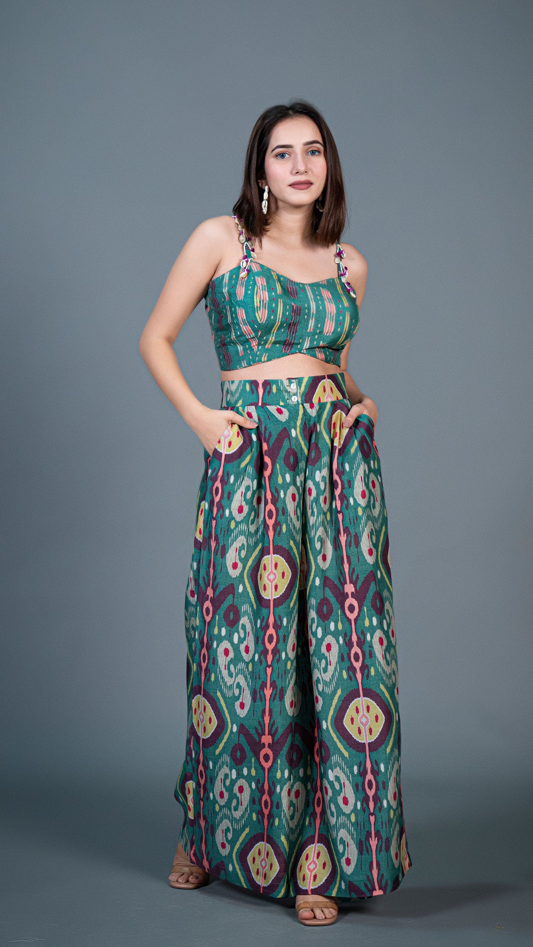 GREEN IKKAT PRINT PLEATED PANTS IN SILK + SILK EMBELLISHED CROP TOP