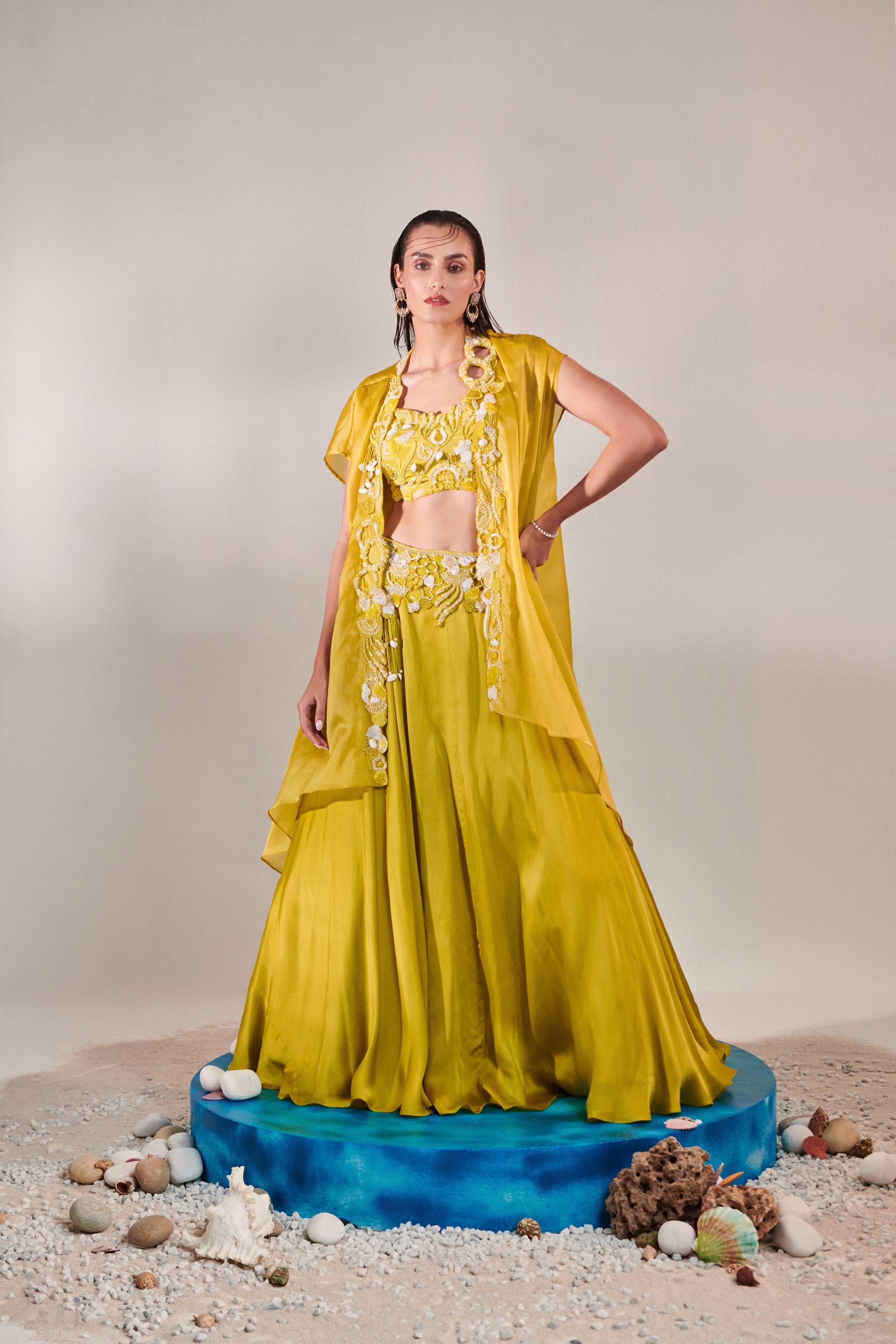 Cutwork blouse; cape; lehenga set