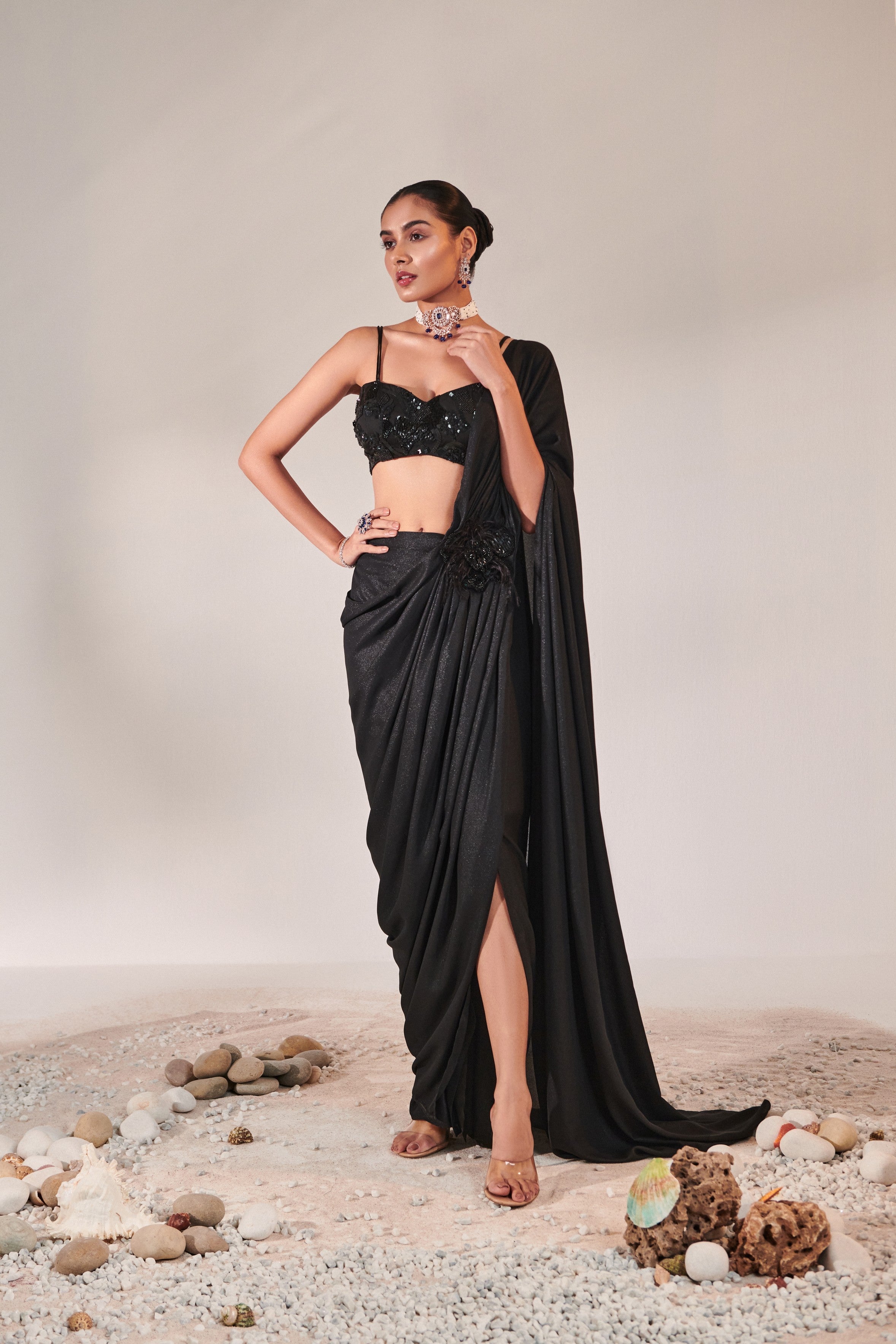 fuss-free pre-stitched drape saree; hand embroidered blouse and feather detailing